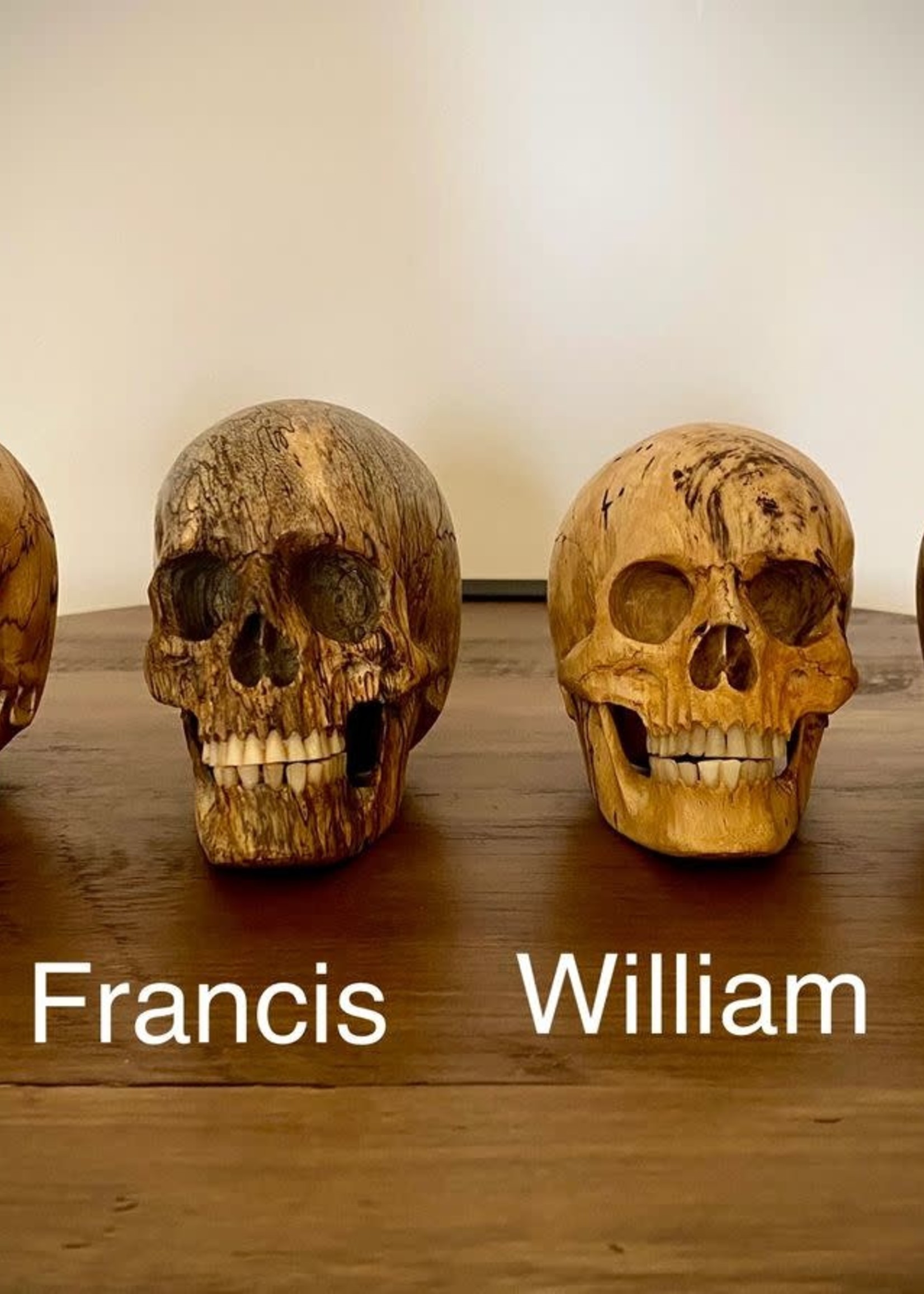 Beautifully Carved Wooden Skulls with Bone Teeth and Articulated Jaws