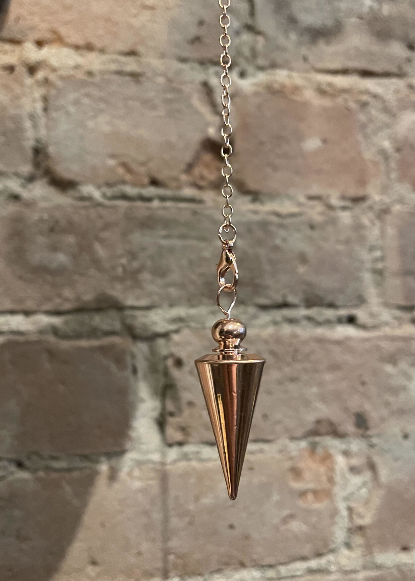 Rose Gold Metal Pendulum