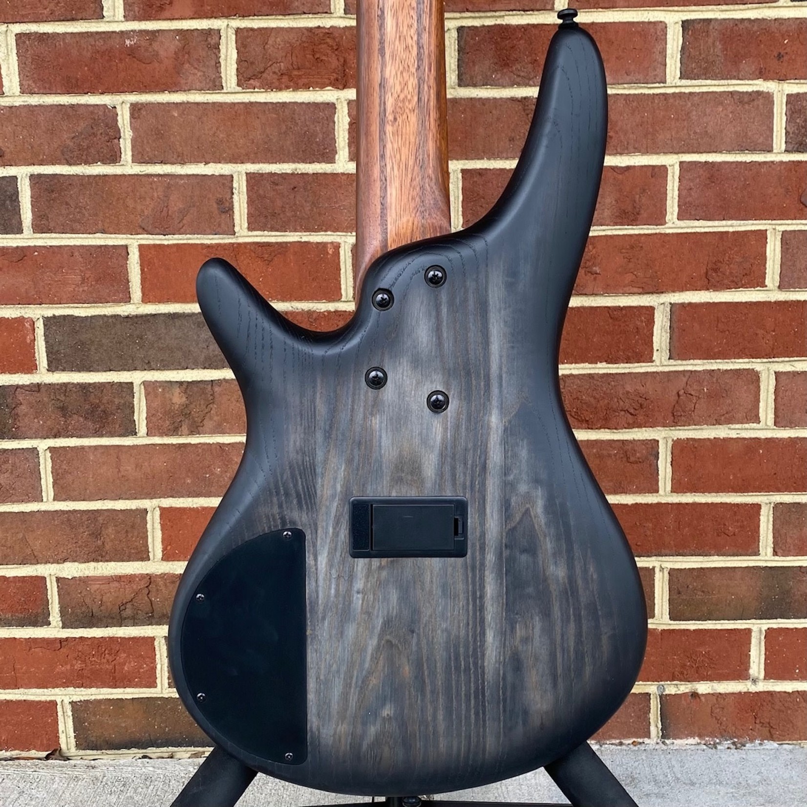 black stained guitar