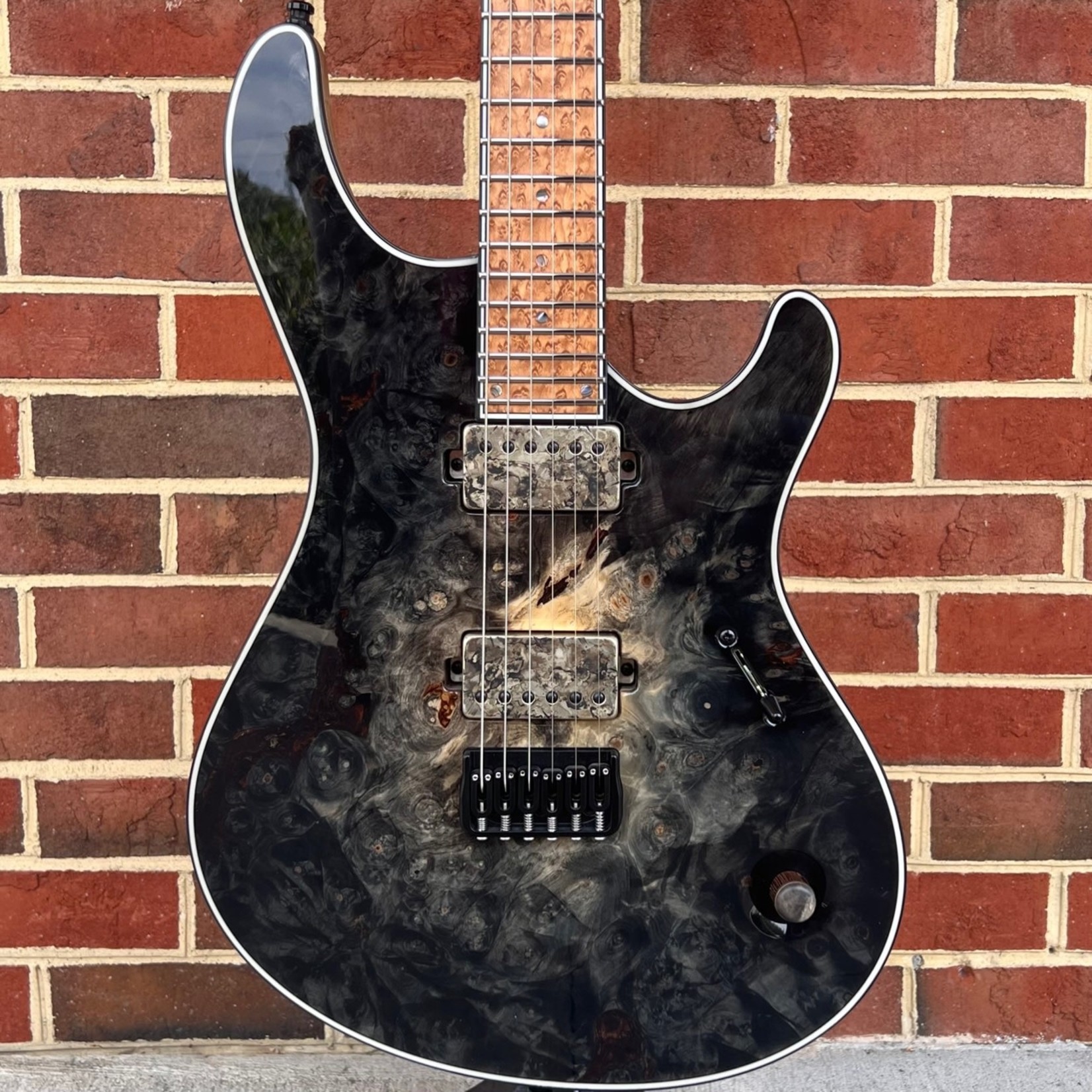 Mayones Mayones 40th Anniversary Regius 6-String, 1pc Master Grade Buckeye Burl Top, Black Burst Gloss, 11ply Exotic I Neck, Black Limba Body, Master Grade TEW Birdseye Maple Fretboard, Flamed Maple Tuner Buttons, Hipshot Locking Tuners and Bridge, Hardshell Case