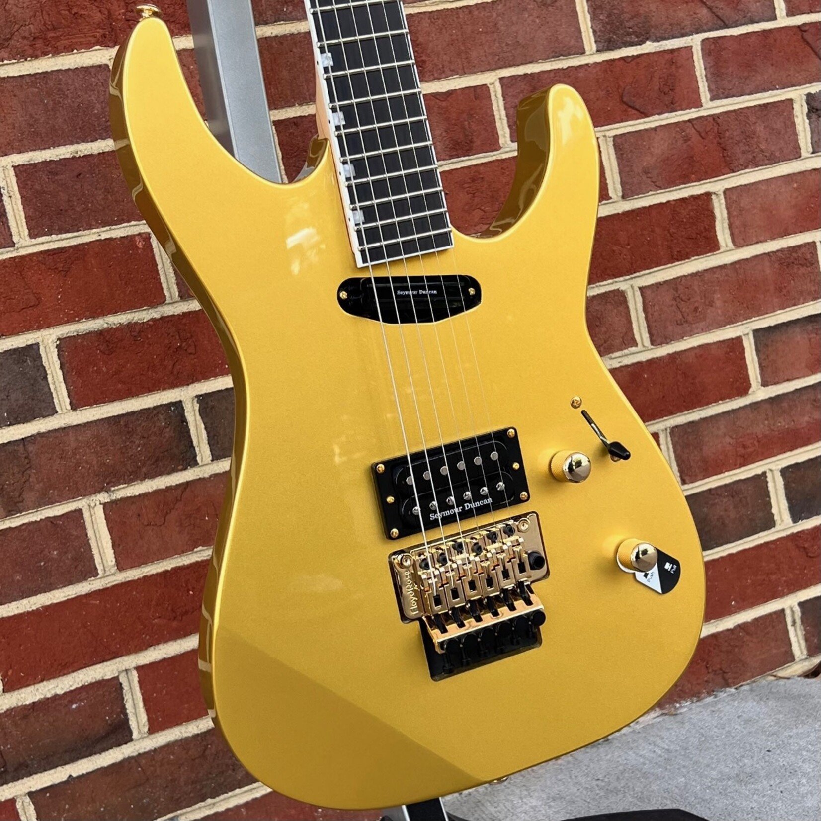 LTD ESP LTD Mirage Deluxe '87, Metallic Gold, Floyd Rose Tremolo, Seymour Duncan Hot Rail/Distortion Pickups, Macassar Ebony Fretboard