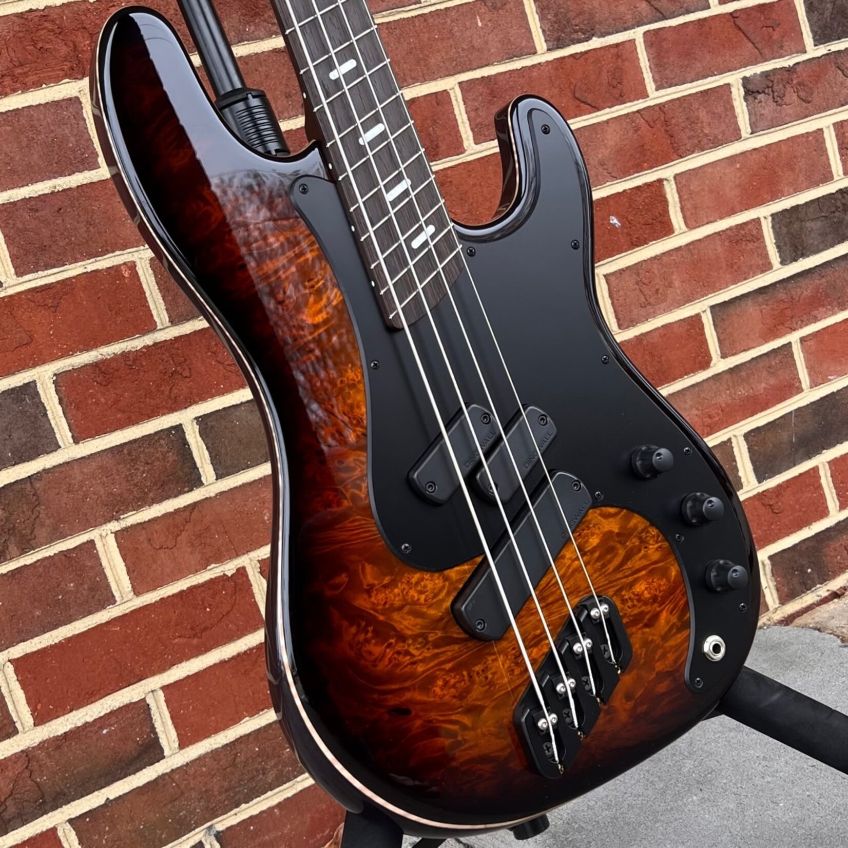 Dingwall Dingwall Super PJ Custom 4-String, Tiger Eye Burst, Maple Burl X-Top, Ash Body - Trans Black, Matte Black Pickguard, Dual P & Super Fatty II Pickups, Wenge Neck & Fretboard, Dunlop Flush Mount Strap Locks, Dingwall Deluxe Gig Bag