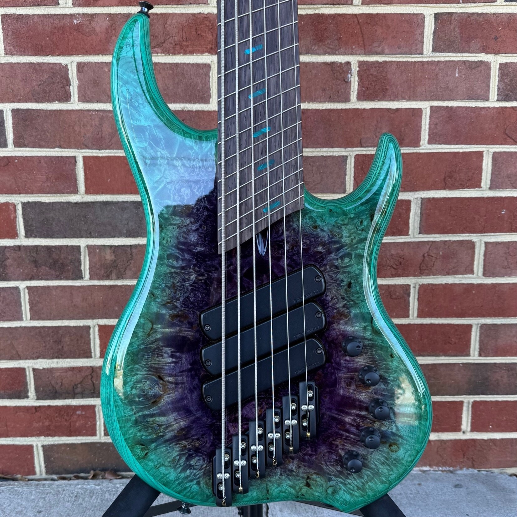 Dingwall Dingwall Z3 6-String, Purple to Turquoise Reverseburst, Maple Burl X-Top, Swamp Ash Body, 5pc Maple Neck, Wenge Fretboard, Colored Pearloid Speedo Bar Inlays, Super Fatty II Pickups, Neve Preamp w/ Master Tone Control, Dingwall Deluxe Gig Bag (USED)