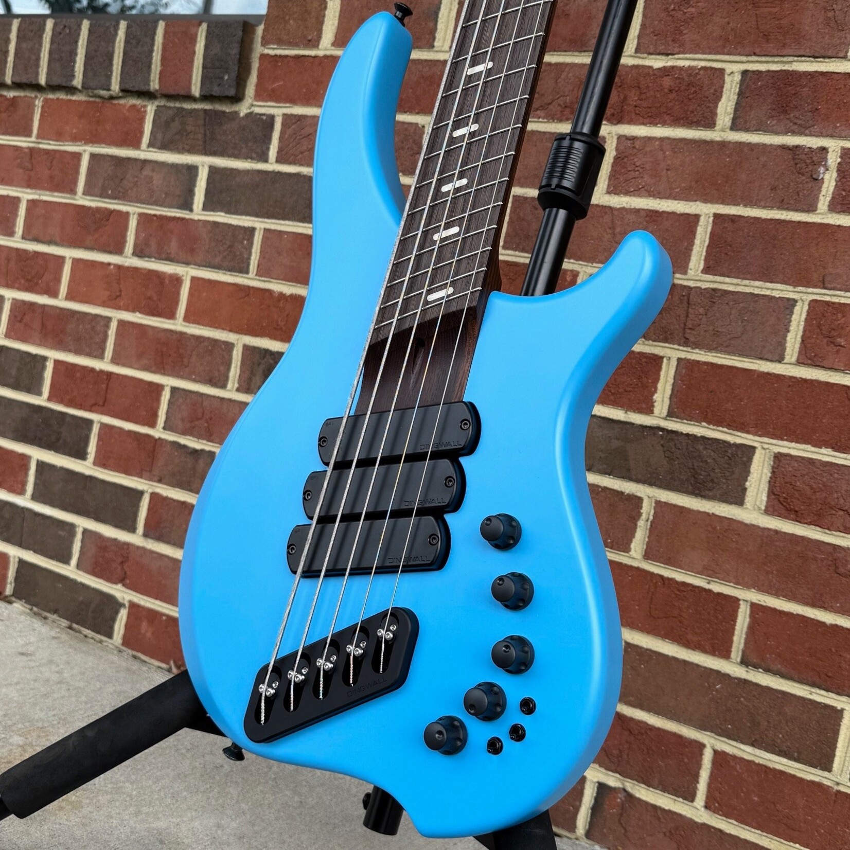Dingwall Dingwall Custom ABI 5-String, NAMM 2025, BMW Marina Blue, Alder Body, Roasted Ash Neck, Wenge Fretboard, White Pearloid Speedo Bars Inlay, Super Fatty II Pickups, Darkglass Tone Capsule w/ Toggles, Dingwall Deluxe Gig Bag