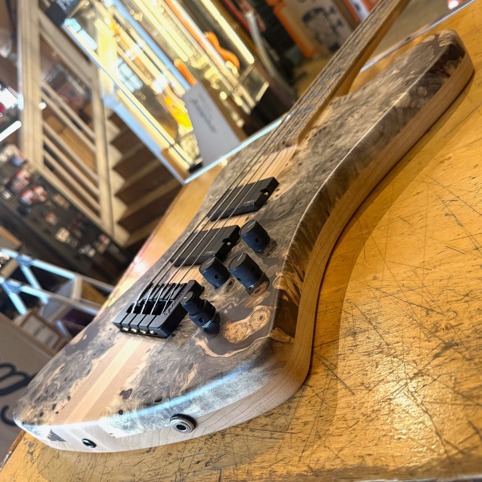 Spector Spector USA NS-4X, Buckeye Burl Top, Swamp Ash Body, 3pc Maple Neck, Pale Moon Ebony Fretboard, Black Mother of Pearl Inlays, Matching Headstock, EMG 35DCX Pickups, HAZ 18-volt Preamp, Spector Deluxe Gig Bag