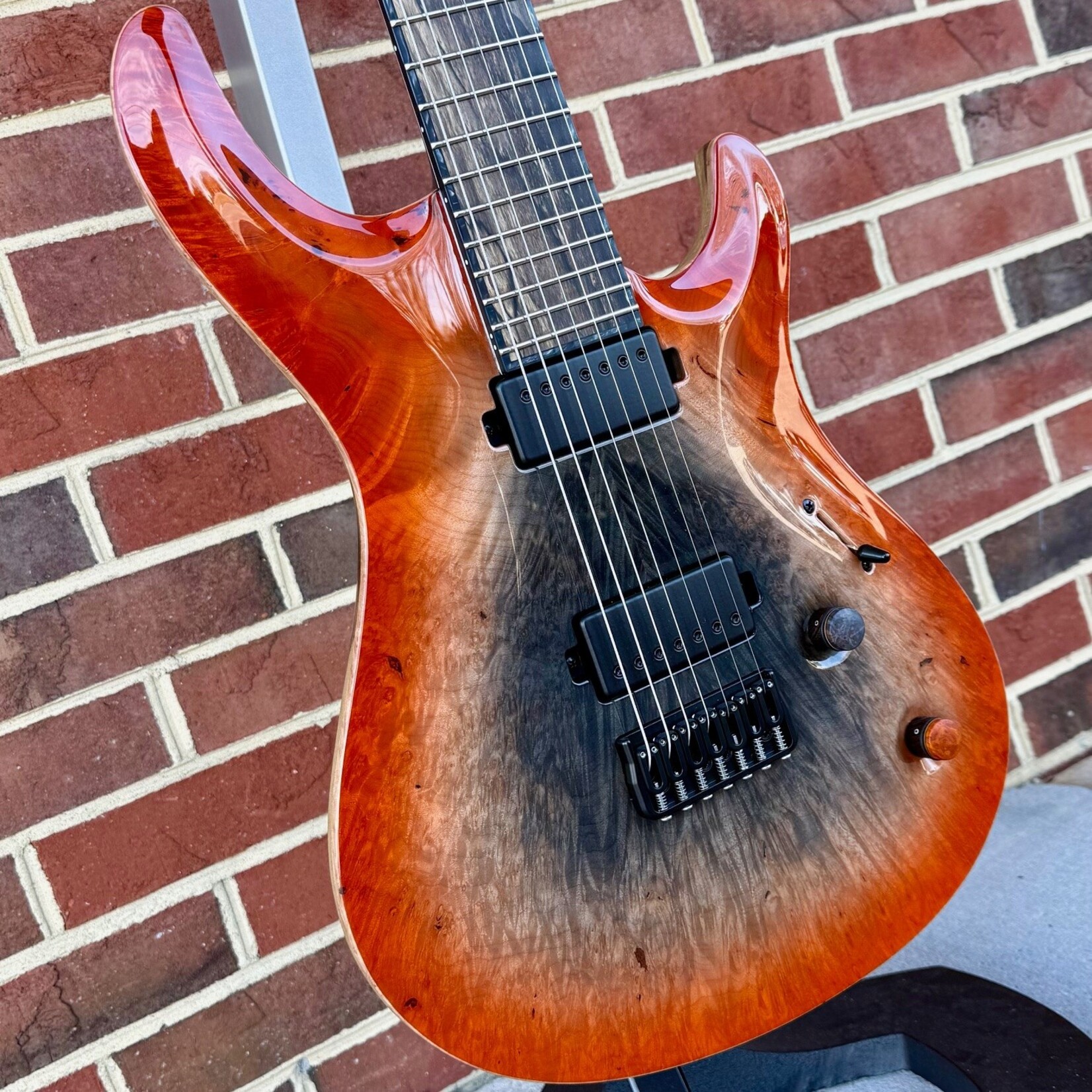 Mayones Mayones Regius Core 7 B27, Supernova Orange, 4A Burl Maple Top, Black Limba Body, 4A Pale Moon Ebony Fretboard, Matching Wood Knobs, Velvetrone Pickups, Mayones Deluxe Hybrid Case