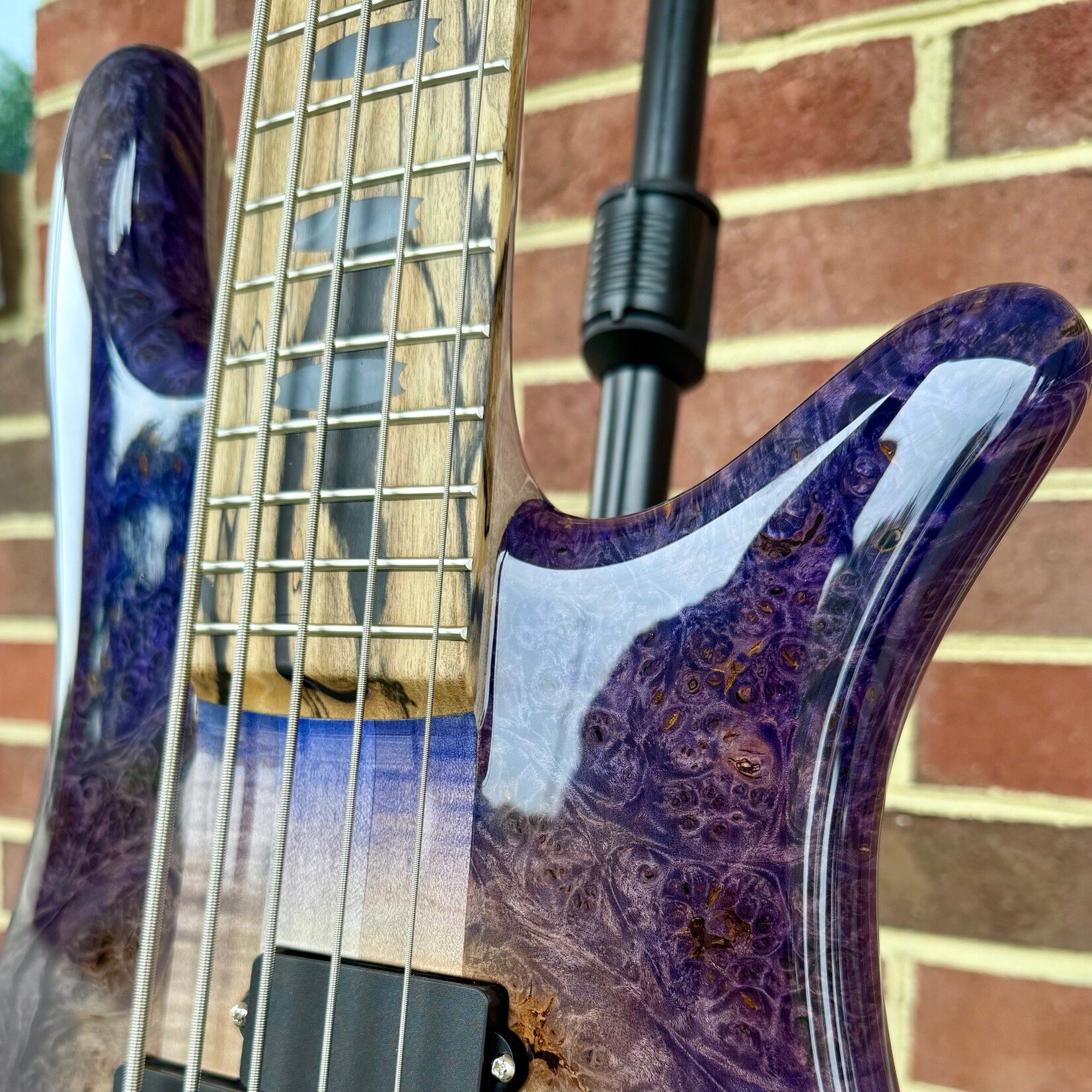 Spector Spector USA NS-5XL, Natural to Purple Burst, Maple Burl Top, Swamp Ash Body, 3pc Maple Neck, Pale Moon Ebony Fretboard, Black Mother of Pearl Crown Inlays, EMG P5X/SJ5X Pickups, HAZ 9-Volt, TSA Case