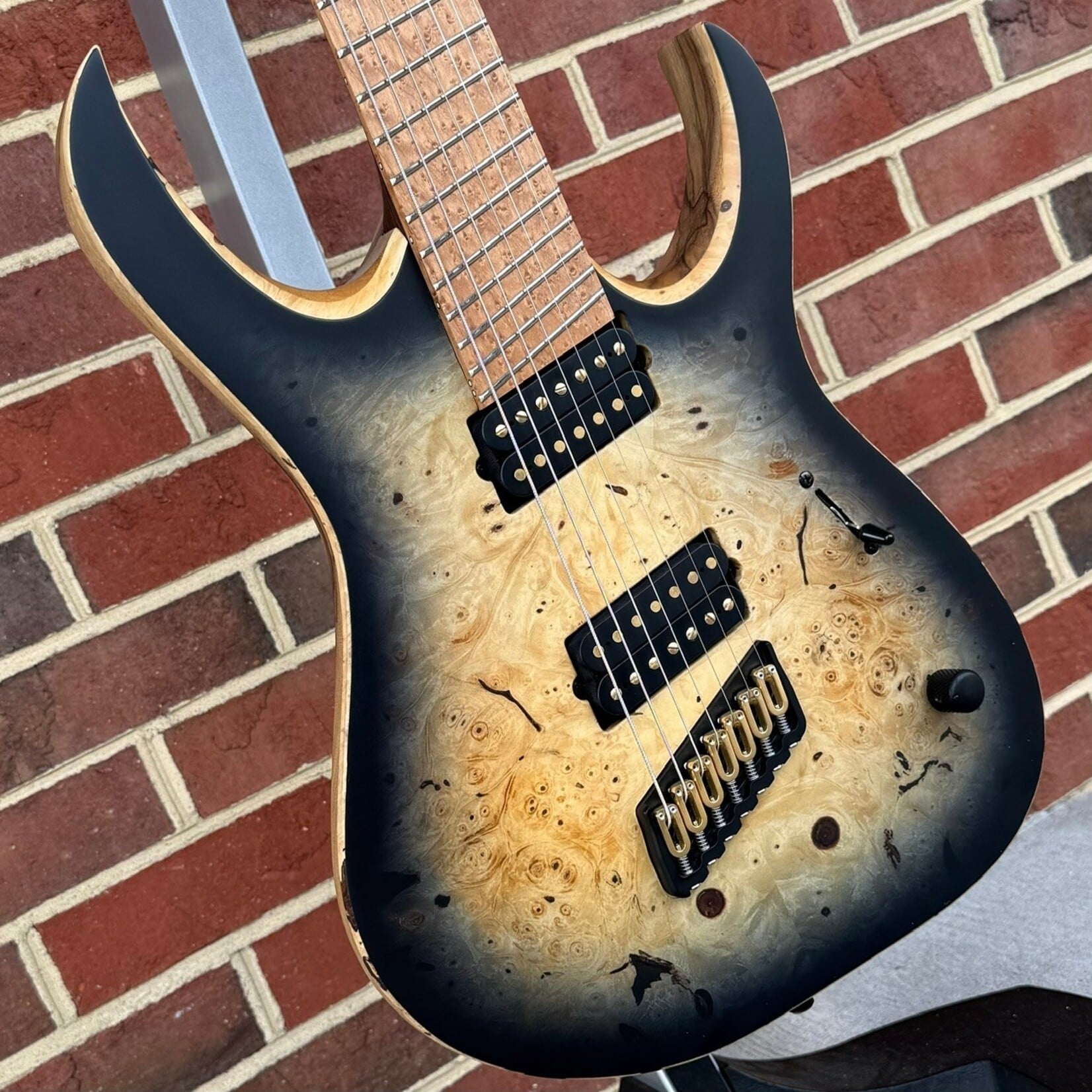 Mayones Mayones Duvell Elite VF 7, Buckeye Burl Top with Black Burst, Black Limba Body, 5pc Wenge/Purpleheart Neck, Roasted Birdseye Maple Fretboard, Velvetrone Ironside + Solium Pickups, Hipshot Bridge & Tuners, Mayones Hybrid Case