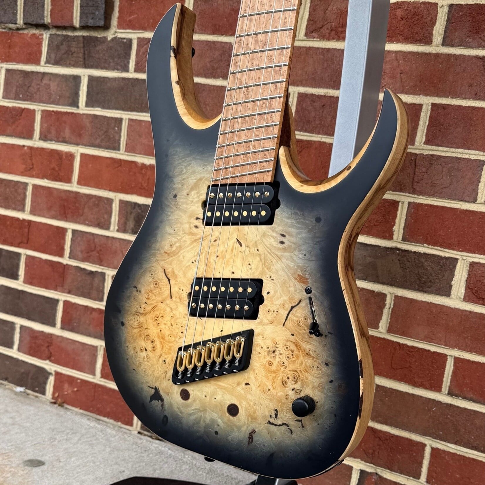 Mayones Mayones Duvell Elite VF 7, Buckeye Burl Top with Black Burst, Black Limba Body, 5pc Wenge/Purpleheart Neck, Roasted Birdseye Maple Fretboard, Velvetrone Ironside + Solium Pickups, Hipshot Bridge & Tuners, Mayones Hybrid Case