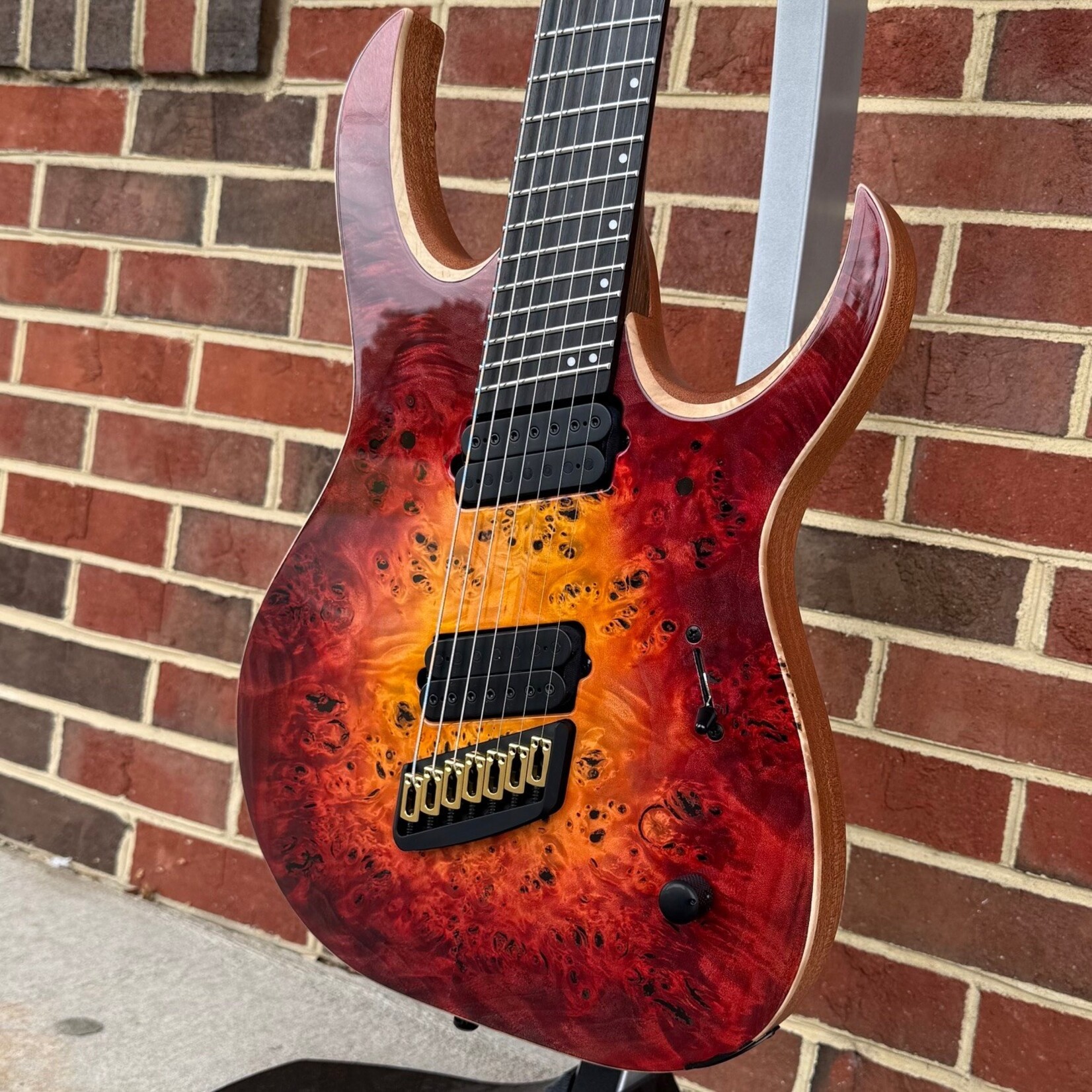 Mayones Mayones Duvell Elite VF 7, Lava Burst Gloss Top, 4A Eye Poplar Top, Mahogany Body, 5pc Wenge/Purpleheart Neck, Ebony Fretboard, Mayones Nola Bridge, Velvetrone Ironside + Solium Pickups, Mayones Hybrid Case