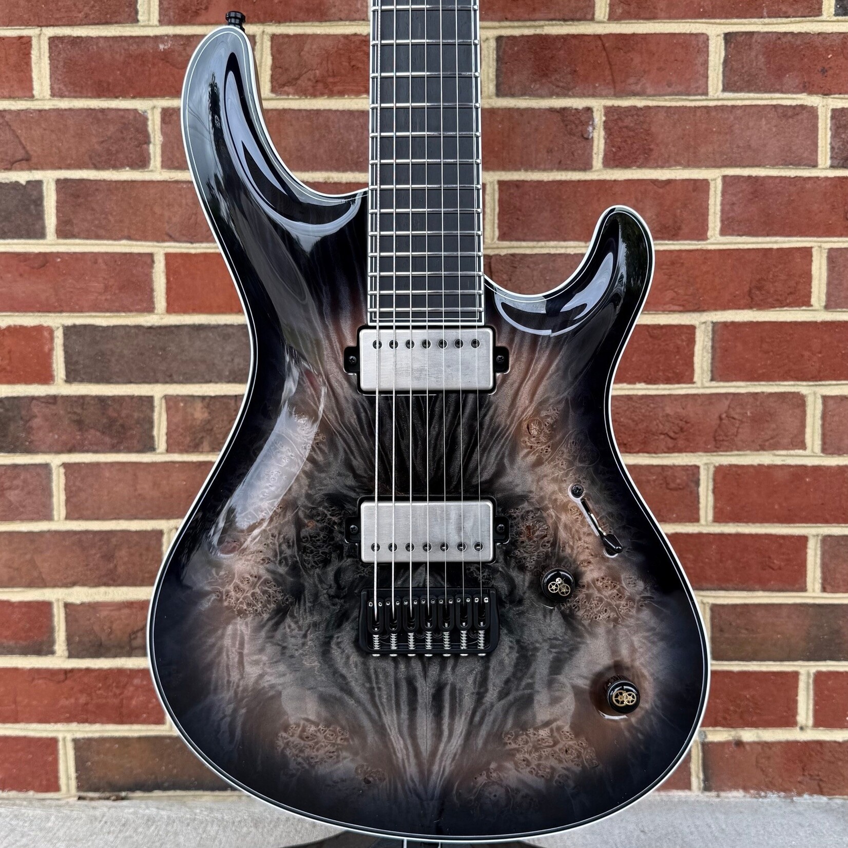 Mayones Mayones Regius Core 7 B26.5, Galaxy Eye Black, 5A Maple Burl Top, Black Limba Body, 11pc Wenge/Mahogany/Purpleheart/Maple Neck, Ebony Fretboard, Hipshot Bridge, Clockwork Knobs, Velvetrone Ironside + Solium Pickups, Mayones Hybrid Double Deck Case