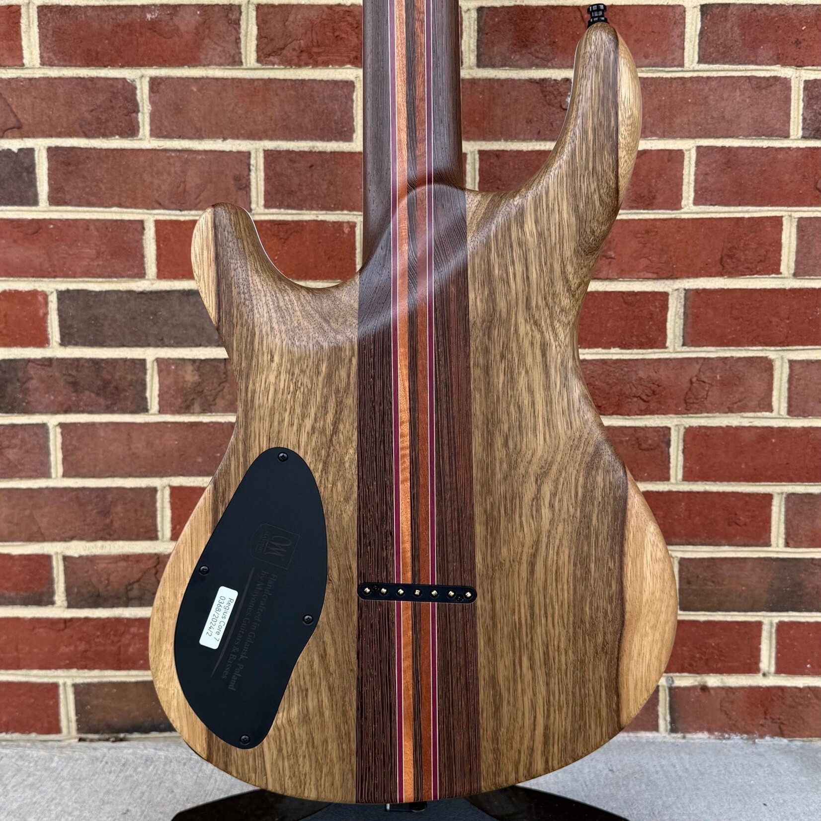 Mayones Mayones Regius Core 7 B26.5, Galaxy Eye Black, 5A Maple Burl Top, Black Limba Body, 11pc Wenge/Mahogany/Purpleheart/Maple Neck, Ebony Fretboard, Hipshot Bridge, Clockwork Knobs, Velvetrone Ironside + Solium Pickups, Mayones Hybrid Double Deck Case