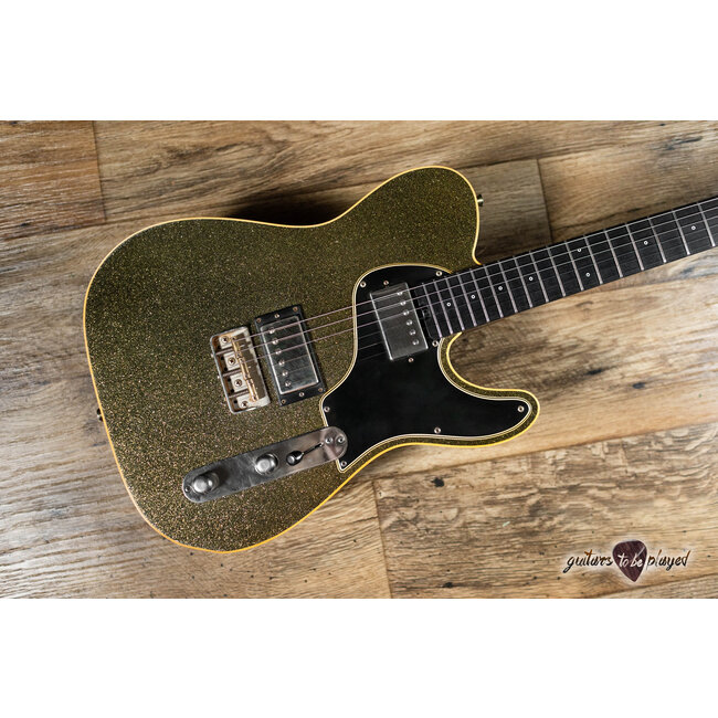 Shabat Lion Special Korina Body w/ Stainless Frets & Flame – Gold/Black Sparkle