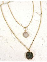 Wall-Gold necklace w/Iridescent Stone