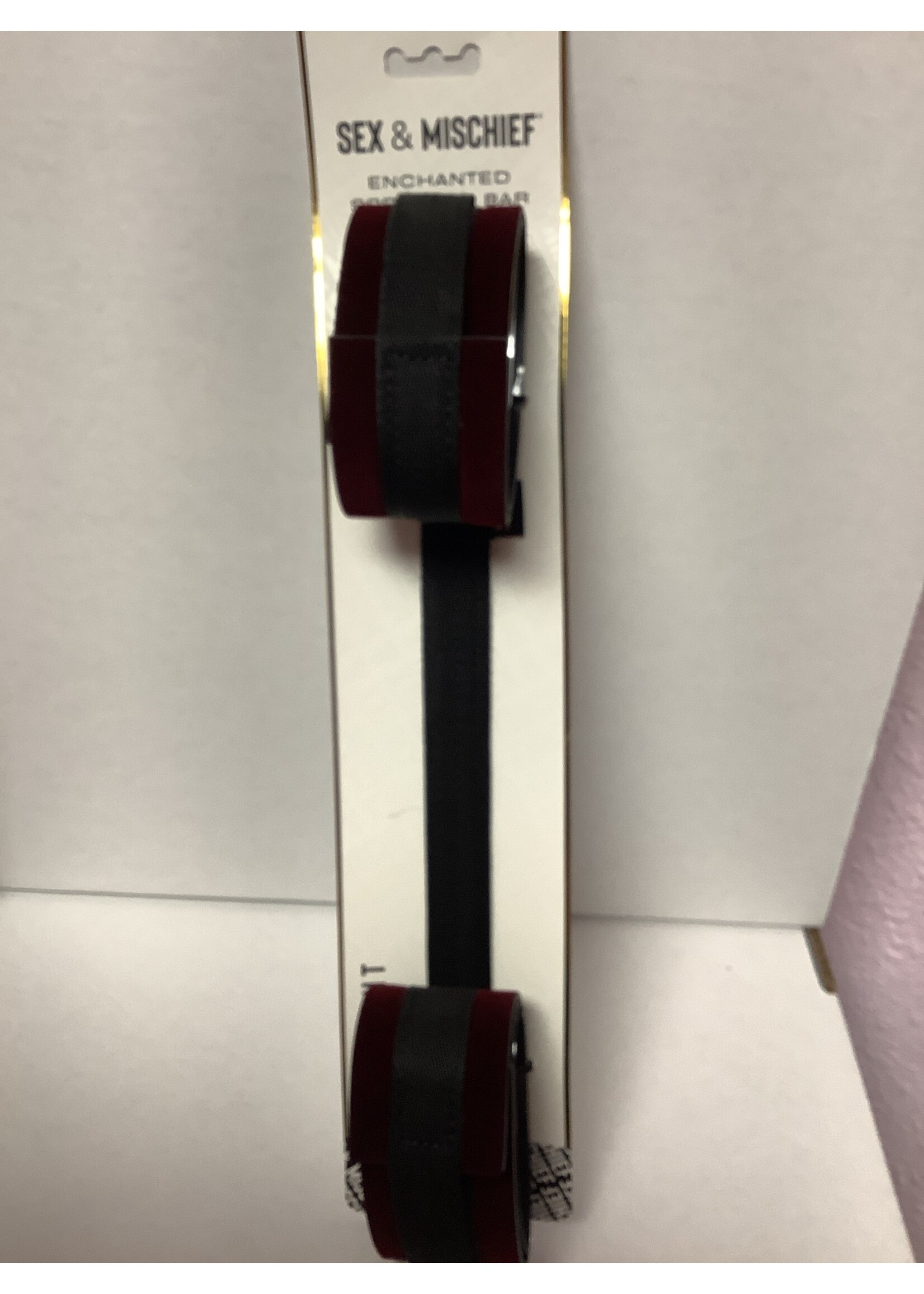 Sex & Mischief spreader bar with handcuffs