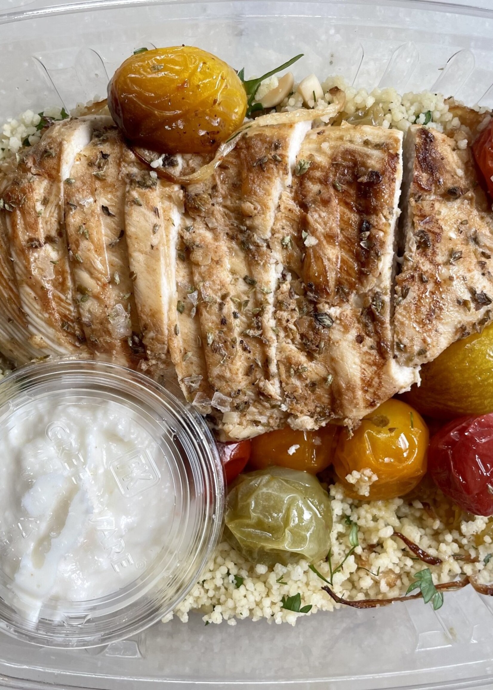 Grilled Chicken over Couscous Roasted Tomato & Golden Raisin Salad