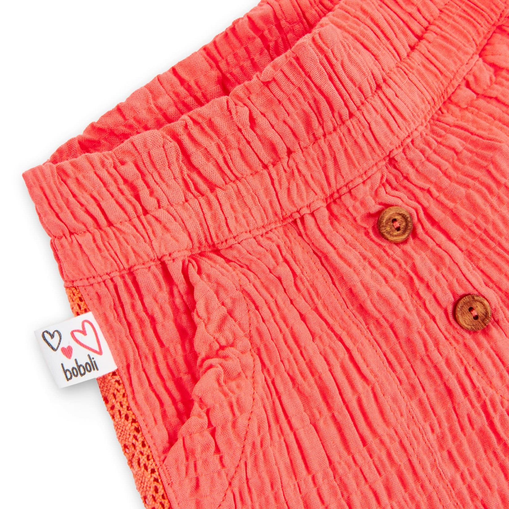 Boboli BOBOLI - Bright coral shorts with wooden buttons at front and embroidery on sides