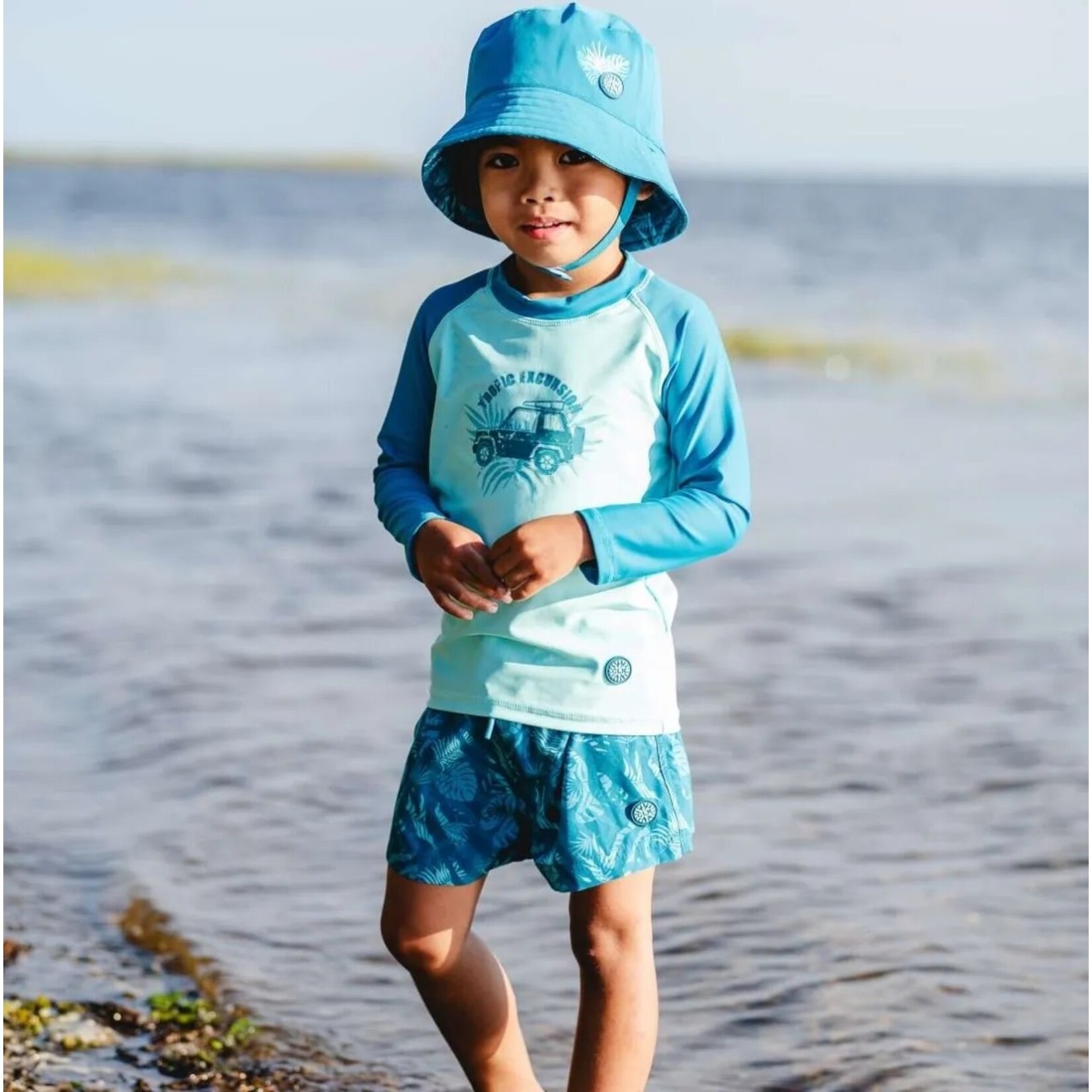 Calikids CALIKIDS - Teal and Blue Swim Shorts with Tropical Foliage Print