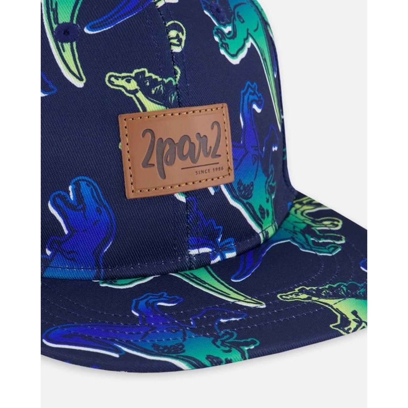 Deux par Deux DEUX PAR DEUX - Casquette  bleu marine avec imprimée de dinosaures bleu et vert