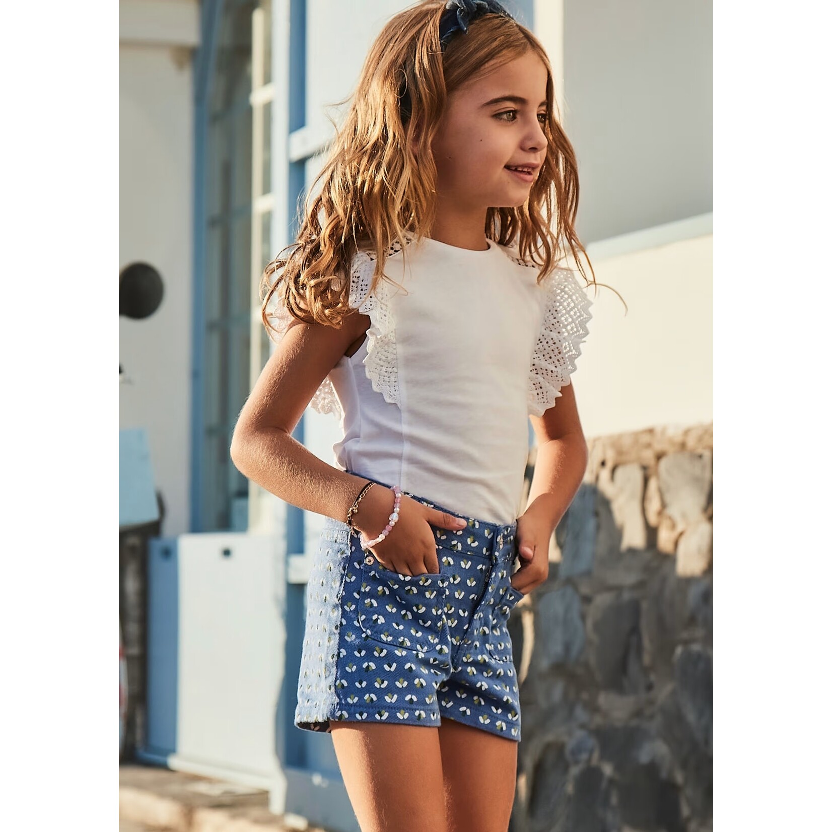 Mayoral MAYORAL - Short en coton bleu marine avec imprimé d'effet fleurs blanches et vertes