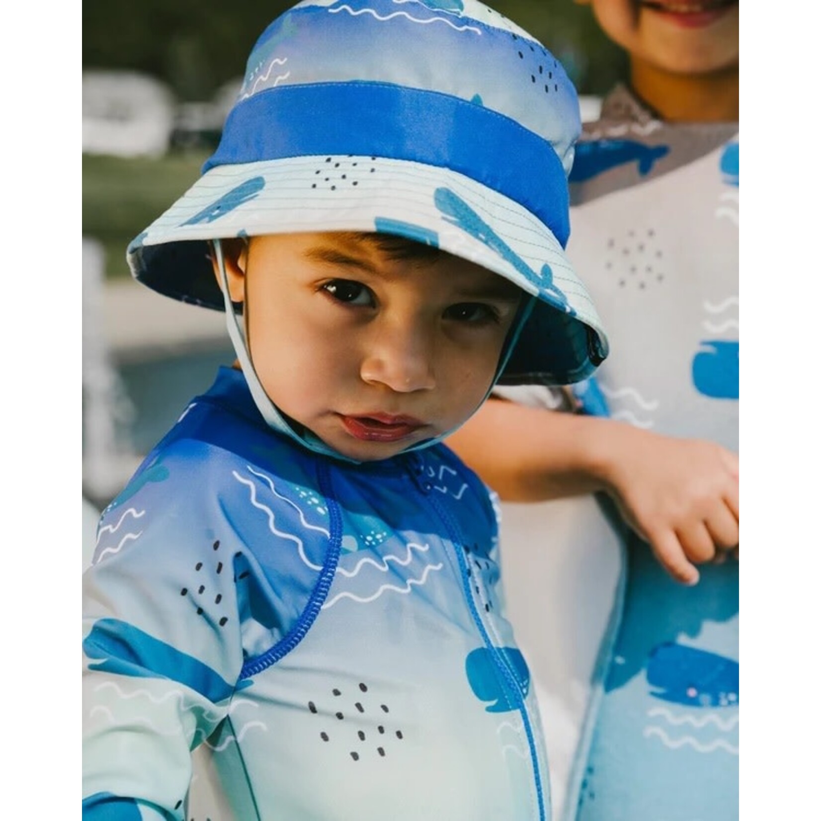 Deux par Deux DEUX PAR DEUX - Blue one-piece long-sleeved swimsuit with whale print  'Comme un poisson dans l'eau'