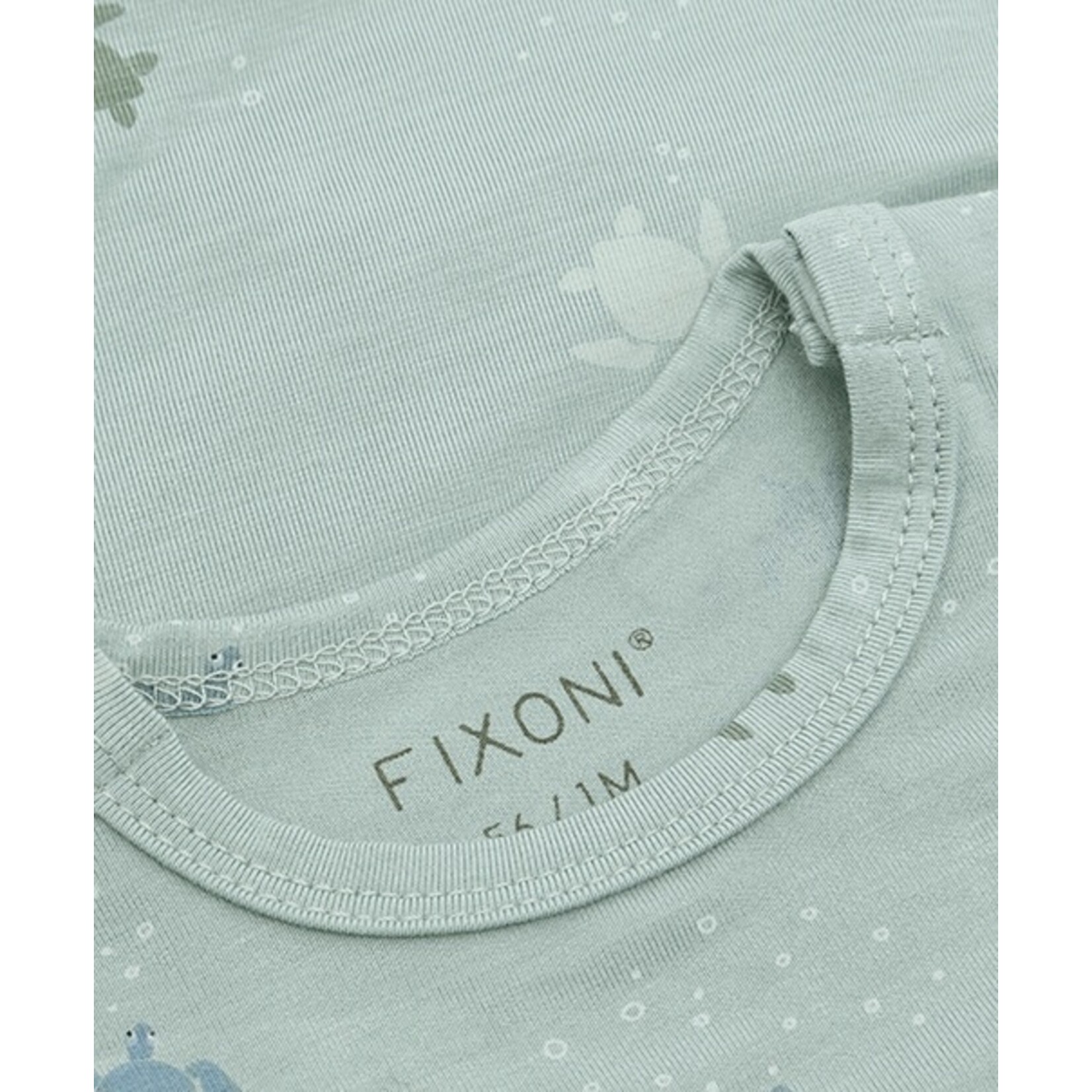 Fixoni FIXONI - Turquoise bodysuit with turtle pattern