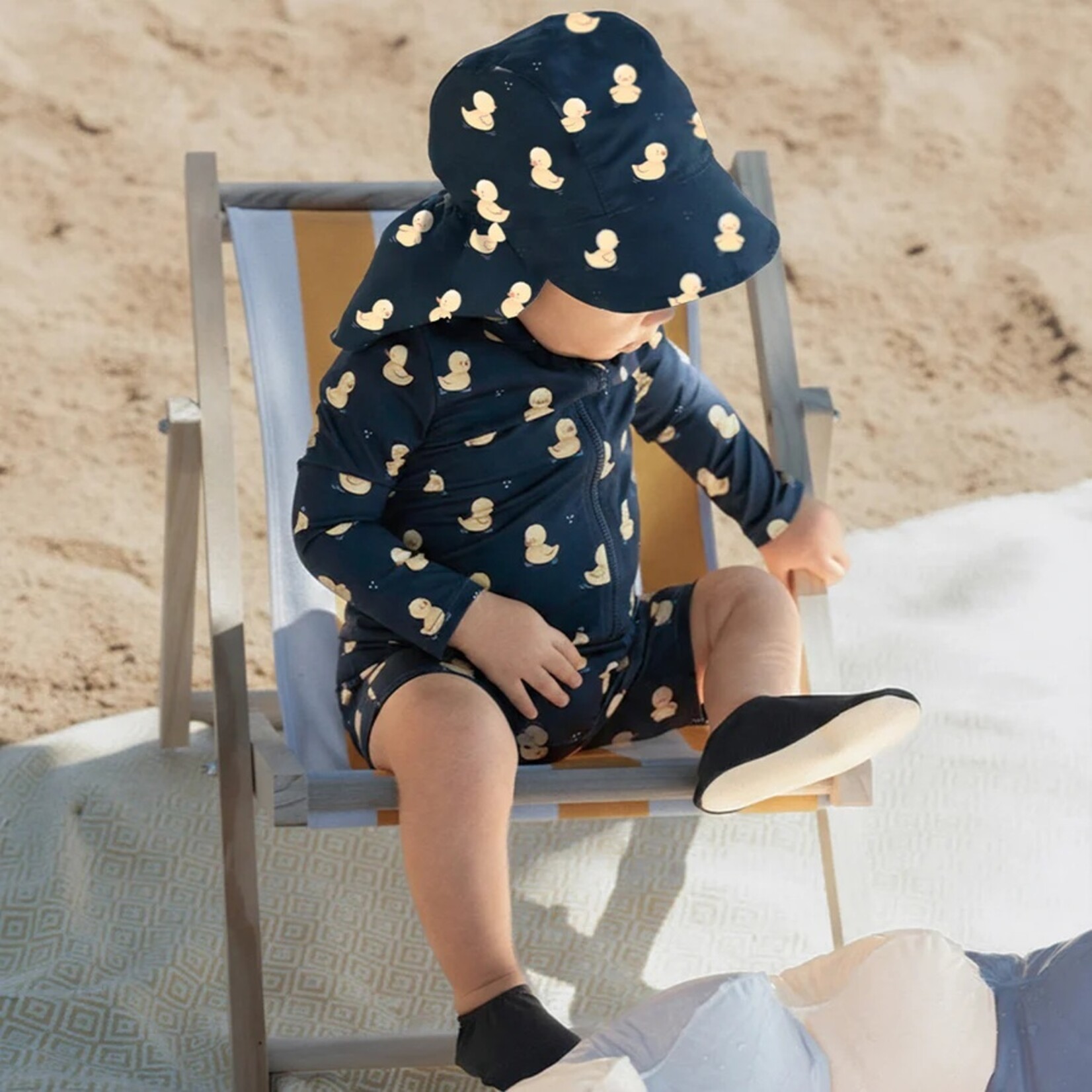 Petit Lem PETIT LEM - Navy blue long-sleeved swimsuit with rubber duck print