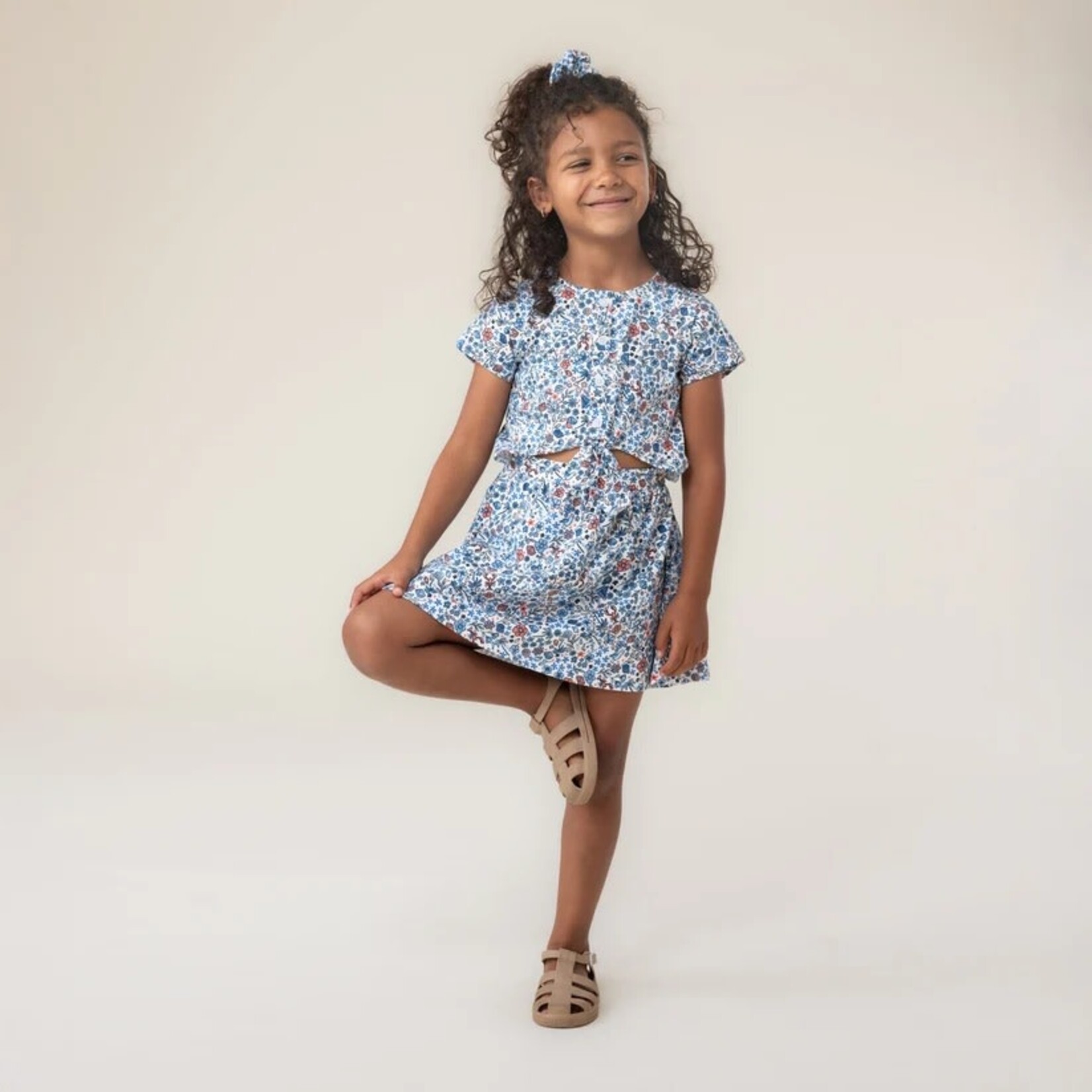 Nanö NANÖ - Ivory dress with a sea-themed print and a cutout at the waist 'Seaside Holiday'