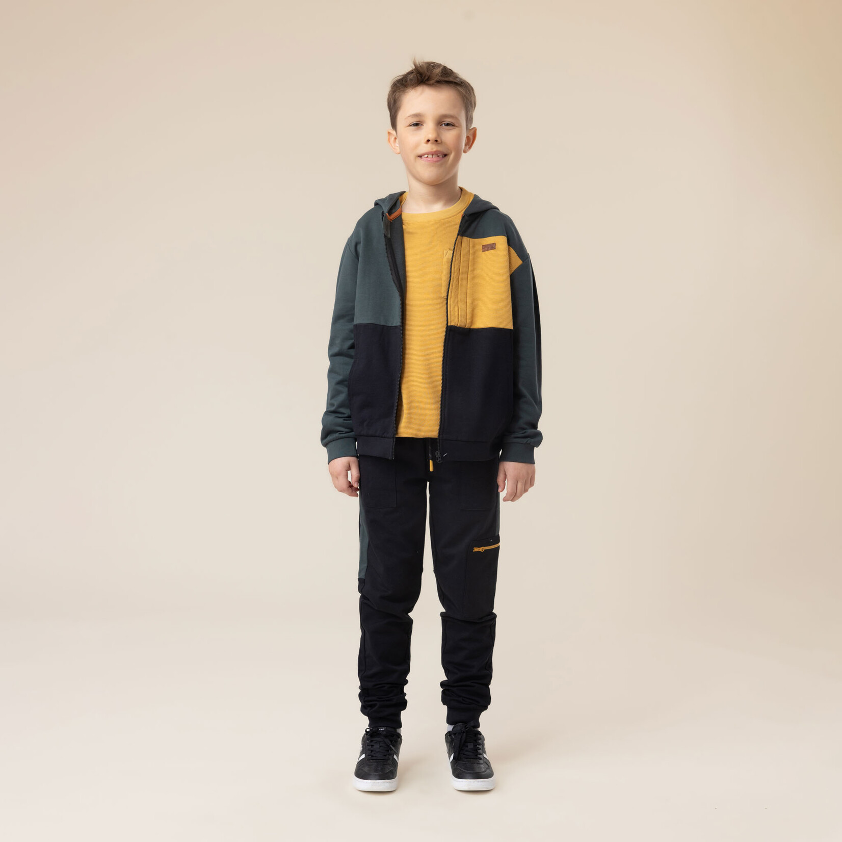 Nanö NANÖ - Green, yellow and black hooded jacket 'Plein gaz!'