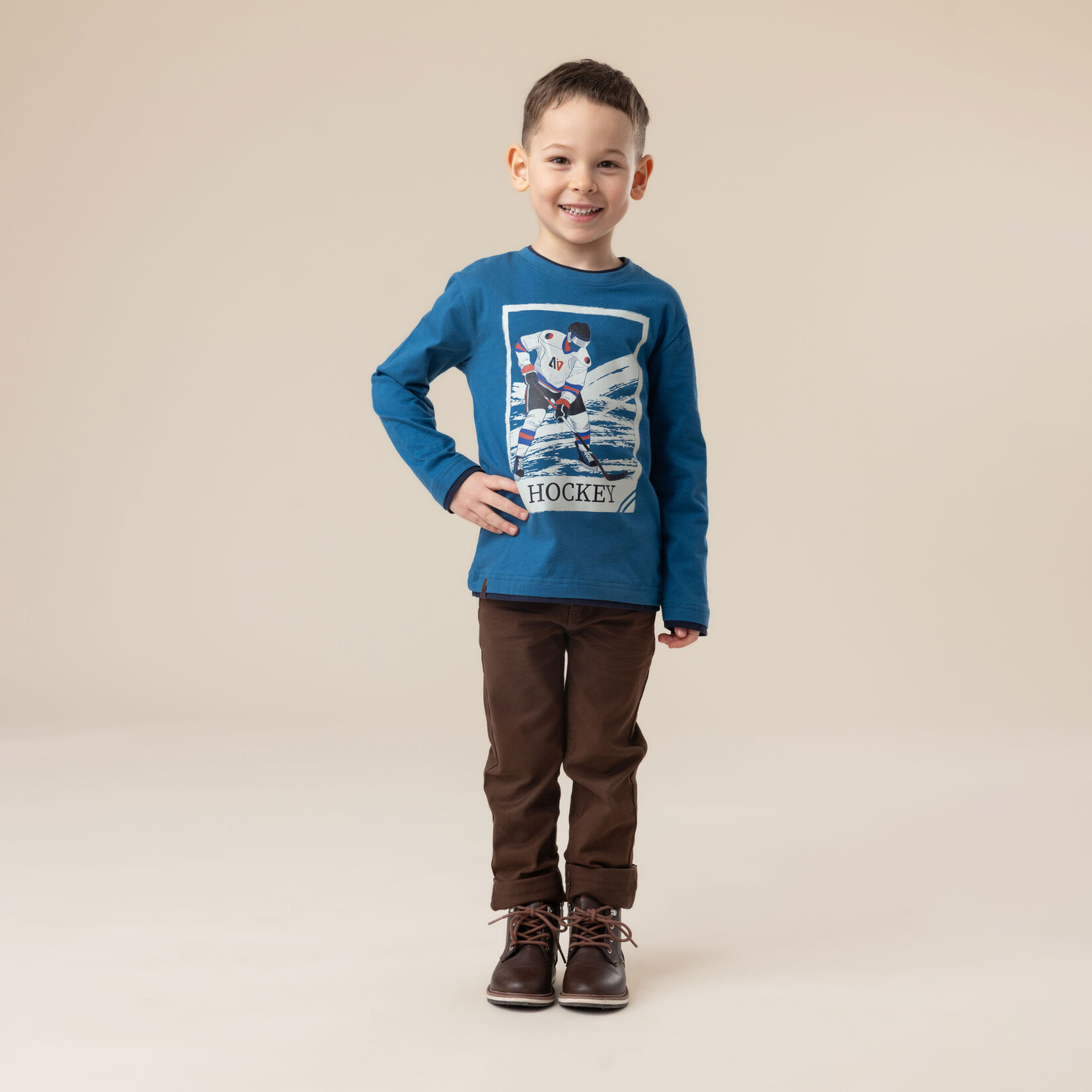 Nanö NANÖ - T-shirt bleu à manches longues avec imprimé d'un joueur d'hockey 'Esprit sportif'
