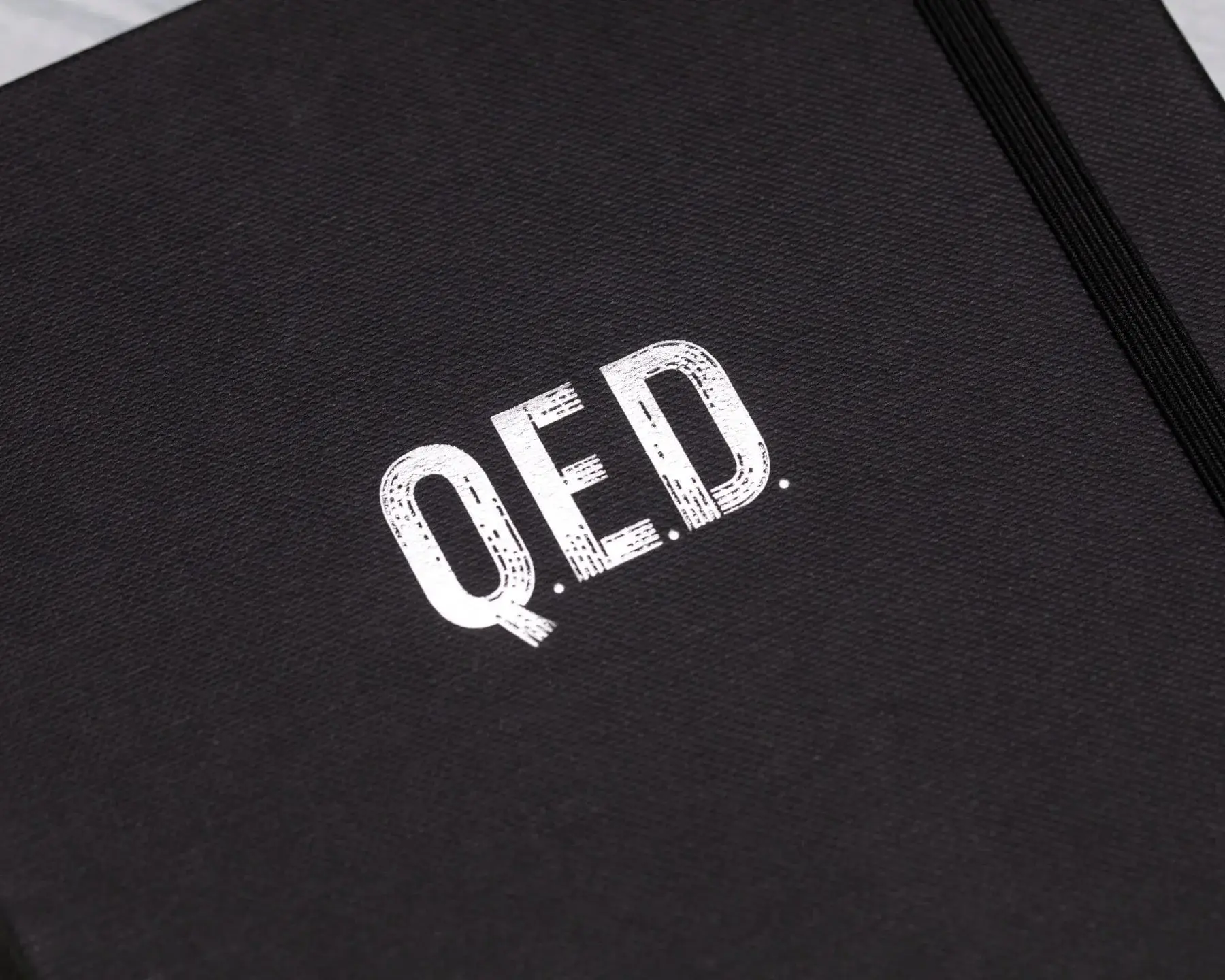 Q.E.D. Hardcover Notebook - Dotted Lines