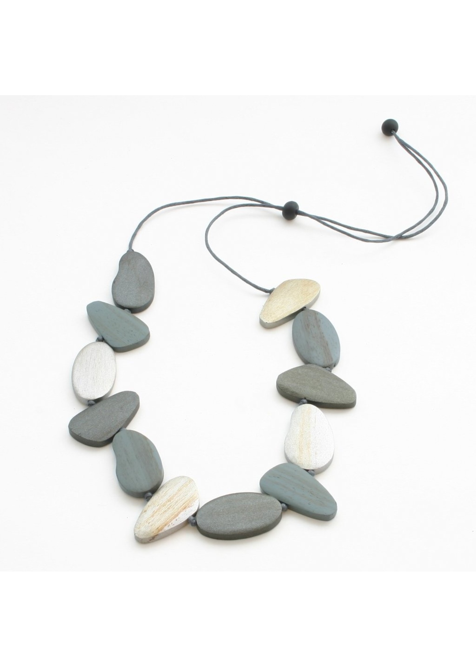 Suzie Blue Tinted Wooden Pebble Necklace | Suzie Blue