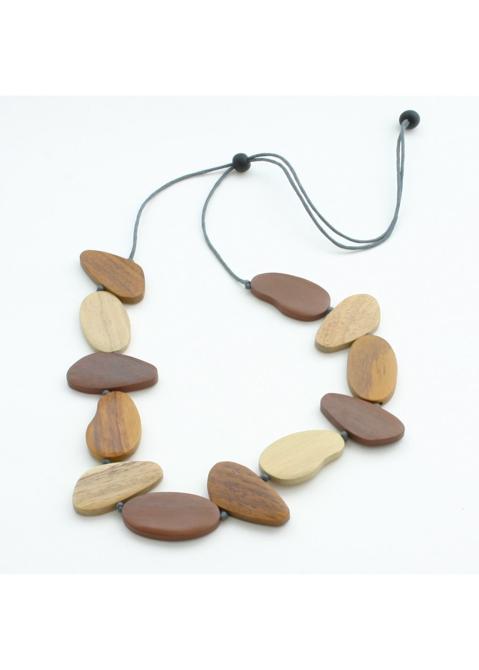 Suzie Blue Tinted Wooden Pebble Necklace | Suzie Blue