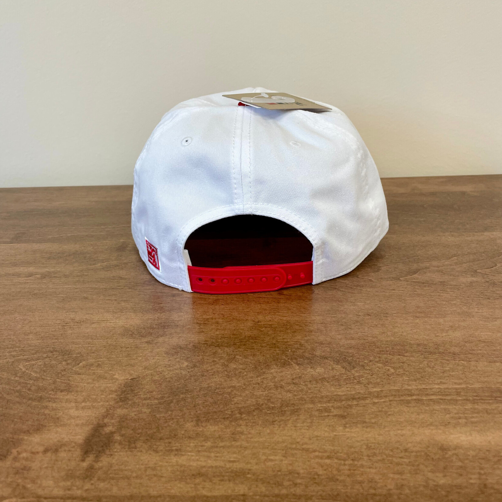 White cap w/Red Bill