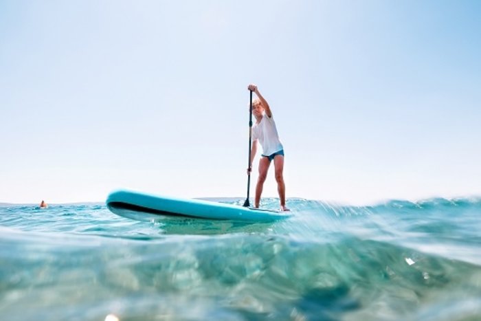 Here’s Why You Should Try Stand Up Paddleboarding