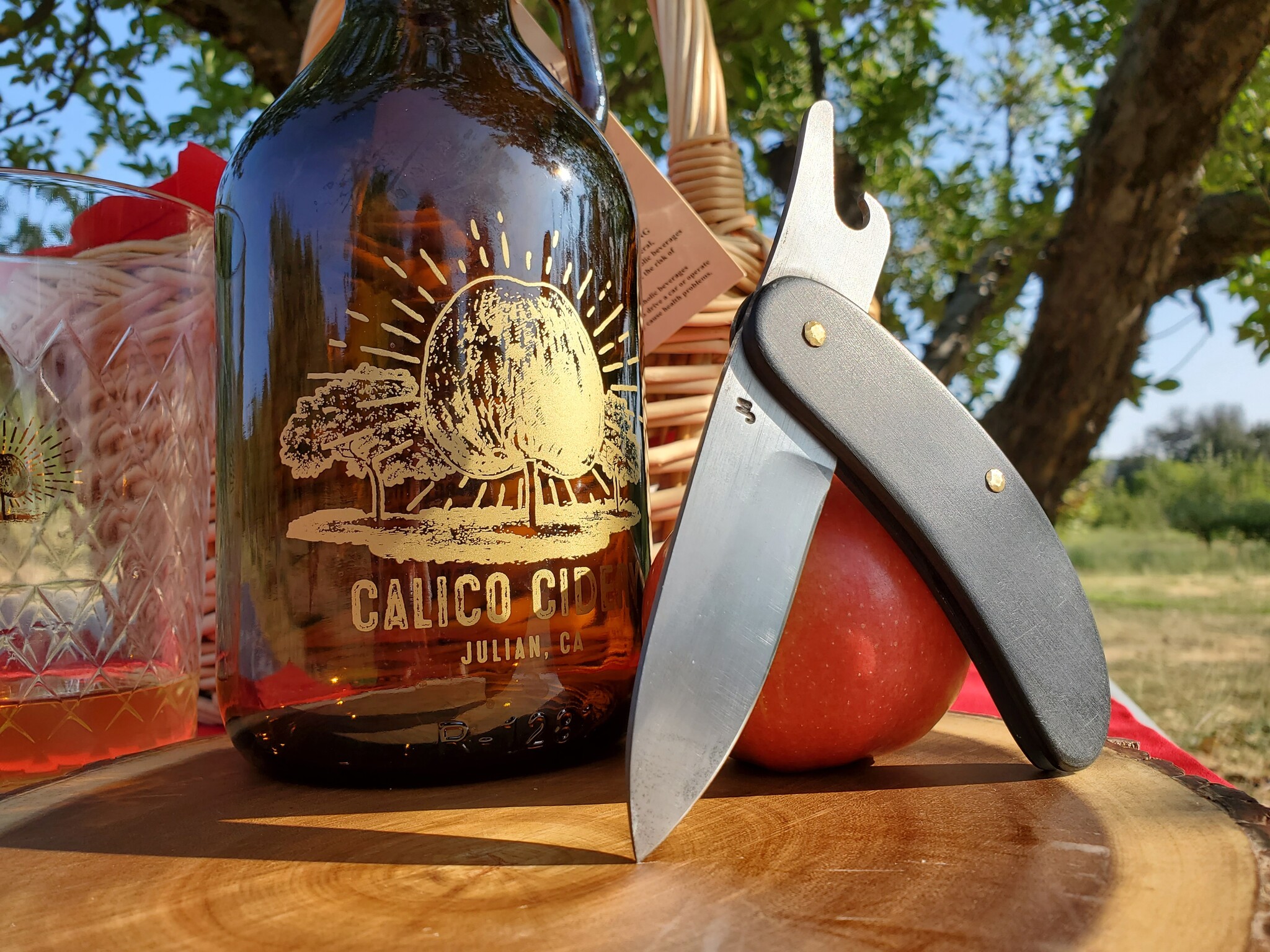 A custom Jeff Morgan friction folder knife with bottle opener in julian california