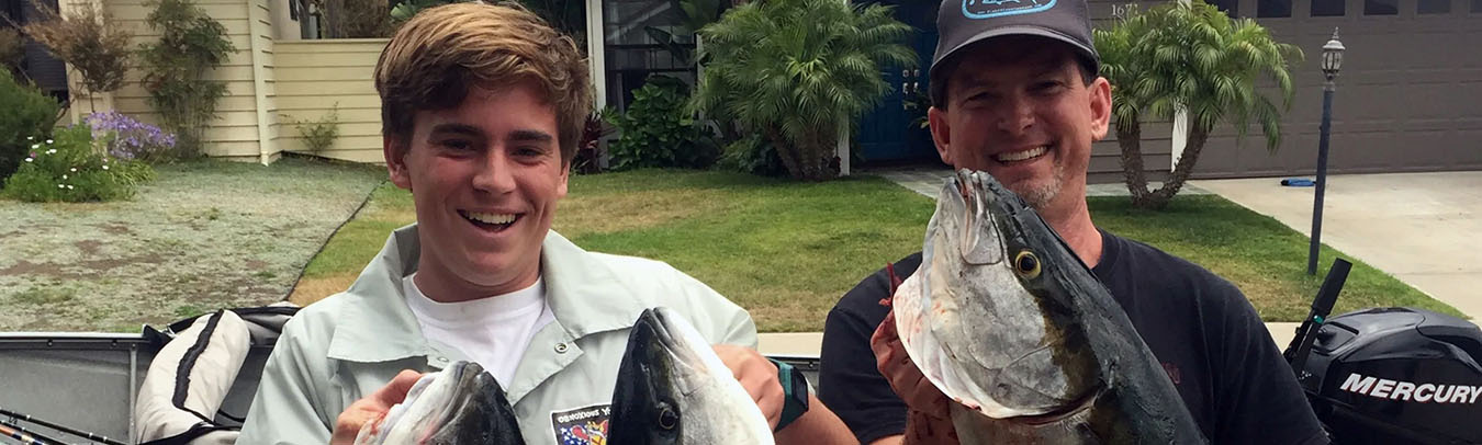 Scott & son holding fish