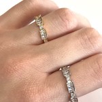 Baguette band ring w/ round CZ stations