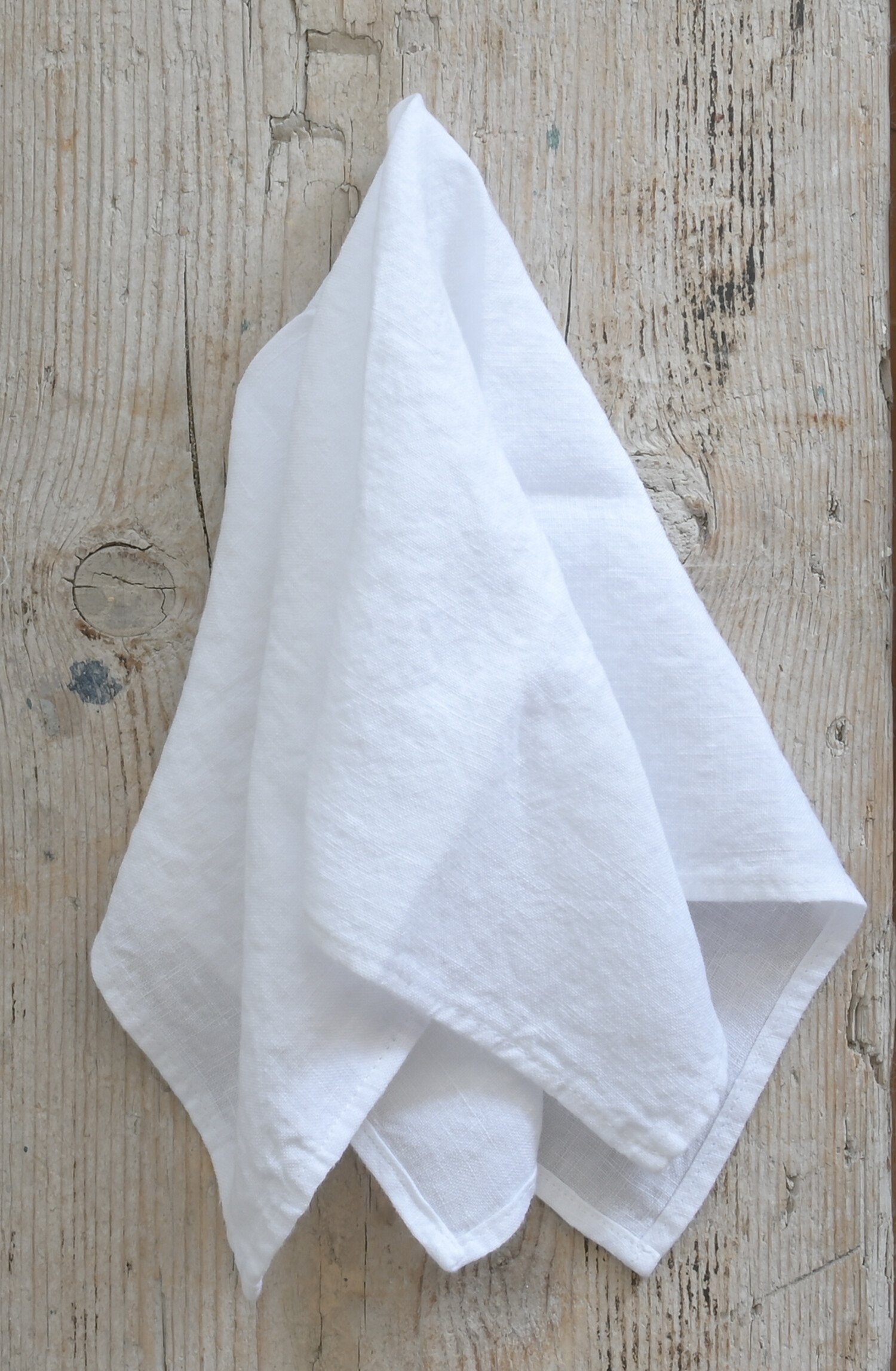 https://cdn.shoplightspeed.com/shops/649159/files/57520769/1500x4000x3/linge-particulier-white-french-linen-napkins-set-o.jpg