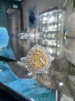 18kW /Y  .72Fancy Yellow Diamonds with .55ctw Diamond Halo