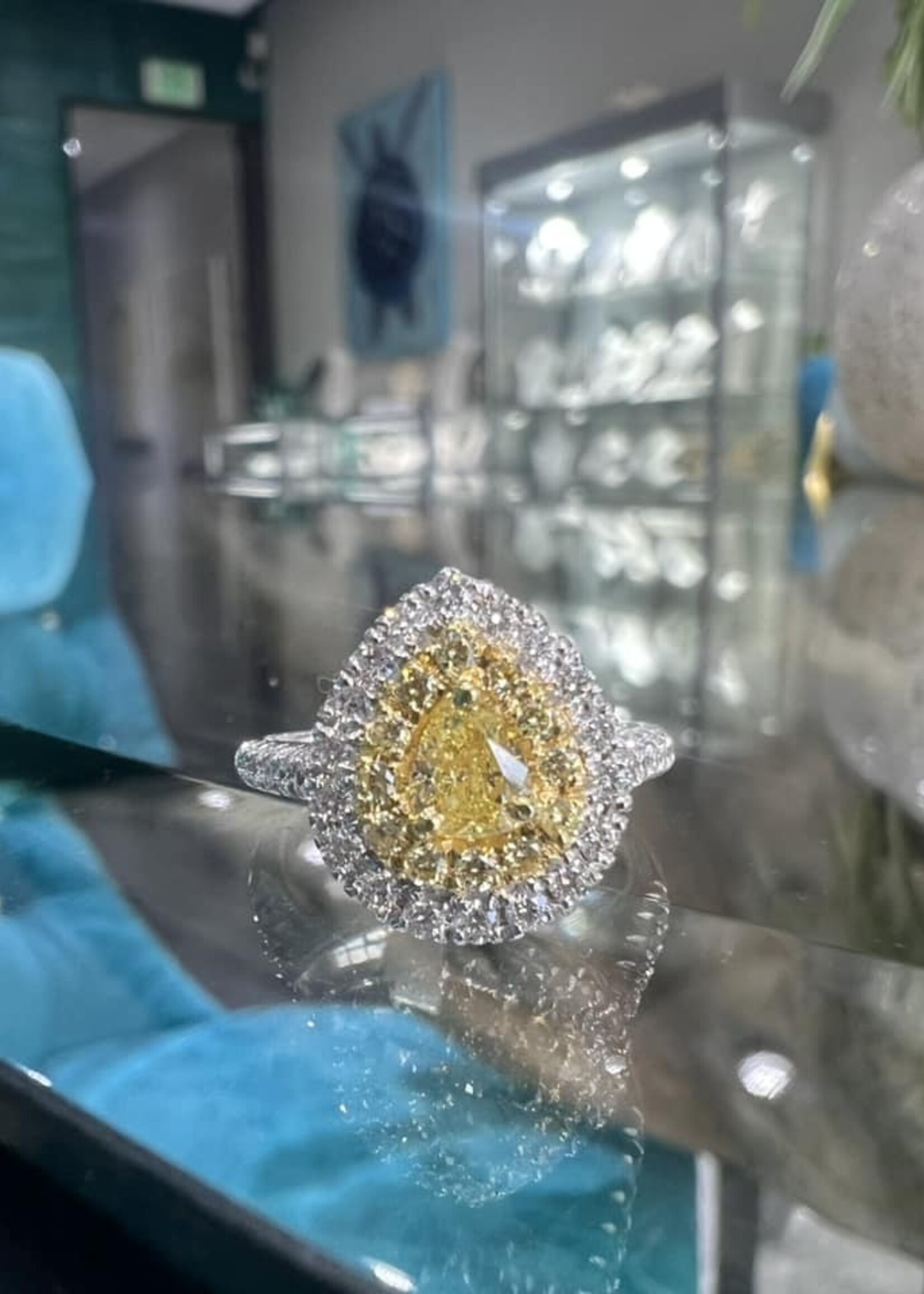 18kW /Y  .72Fancy Yellow Diamonds with .55ctw Diamond Halo