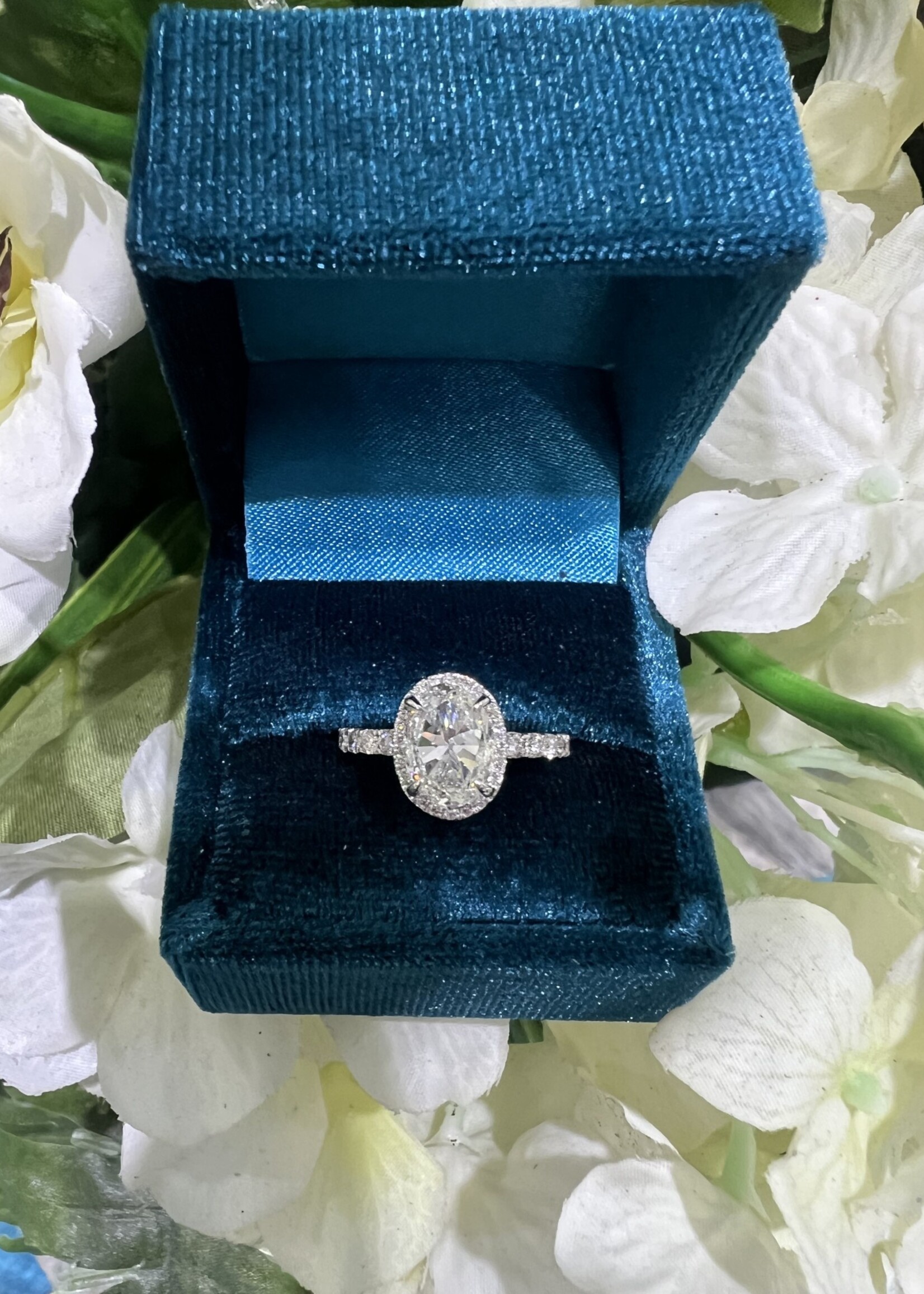 14kW .54ctw Tiny Halo featuring 2ct Naturally Mined Oval Cut H,SI1