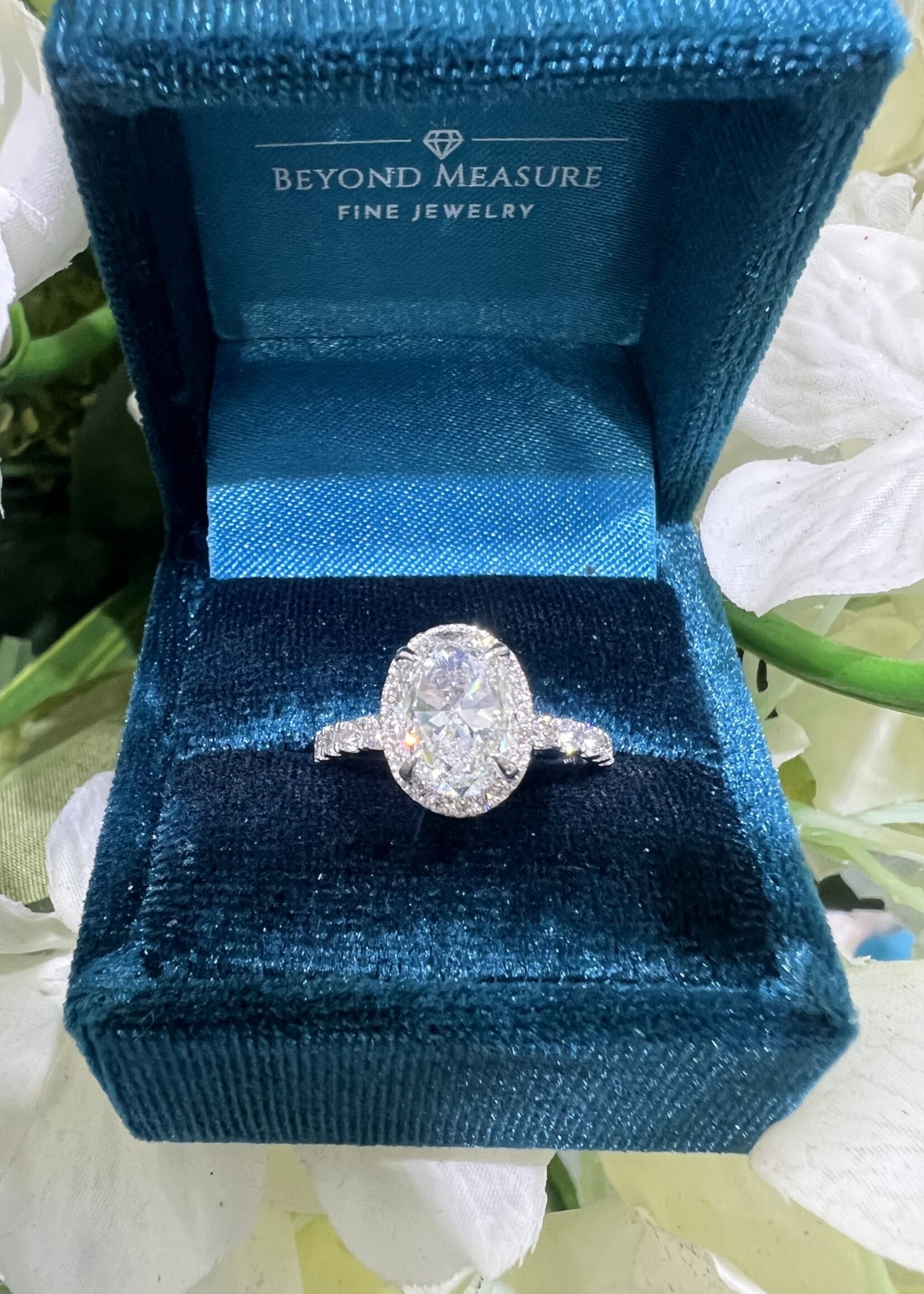 14kW .54ctw Tiny Halo featuring 2ct Naturally Mined Oval Cut H,SI1