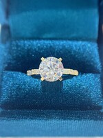 14kY 1/5ctw Baguette cut & 1/8ctw Rounds Natural Diamonds.