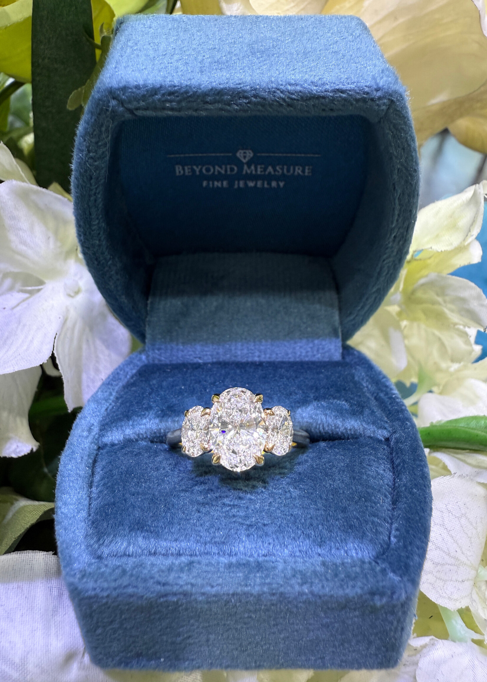 Centurian 14kY Oval Cut Three Stone Engagement Ring 2.07 LabGrown E,VS2 + .96ctw LG oval cut side stones.