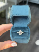 Platinum 3.53carat Naturally Mined Oval Cut Engagement Ring GIA L,SI1  with tapered baguette side stones.