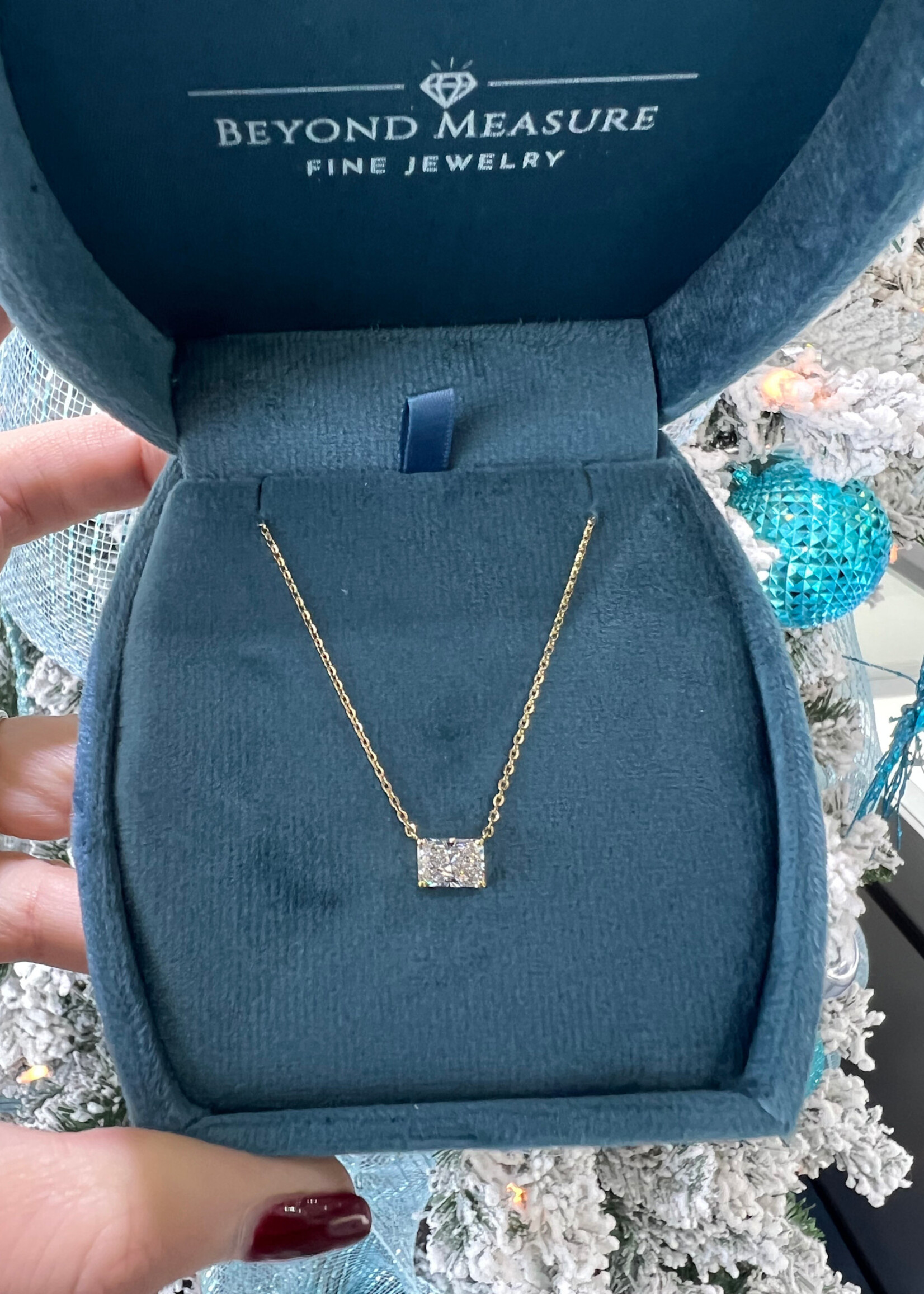 14kY 1.3ctw Radiant Cut LabGrown Diamond pendant.