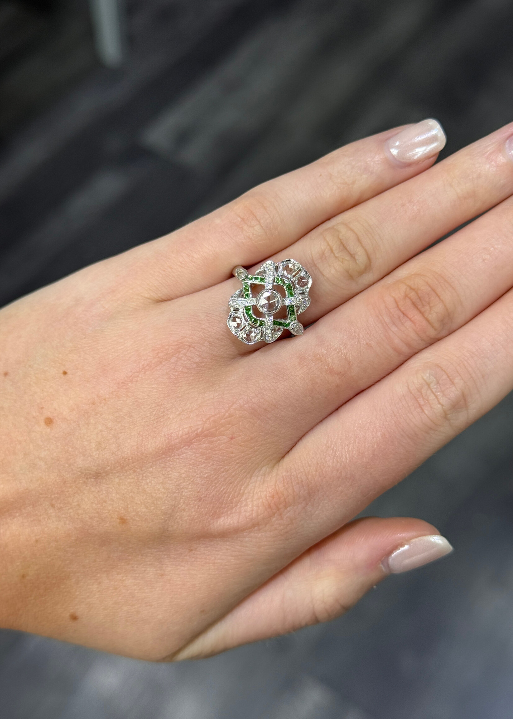 18k Estate Ring with 4mm rose cut diamond, 6 small rose cut diamonds, accent diamonds and tsavorite garnets. Excellent Condition