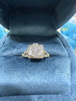 14k Vintage Ring with approximately .70carats of old cut diamonds in white and yellow gold.
