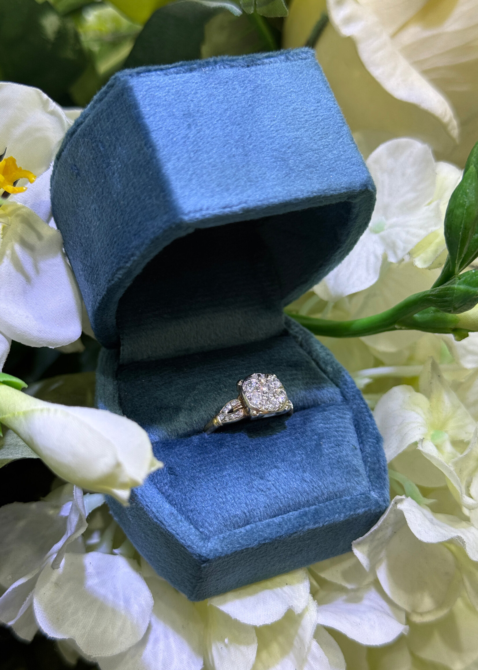 14k Vintage Ring with approximately .70carats of old cut diamonds in white and yellow gold.
